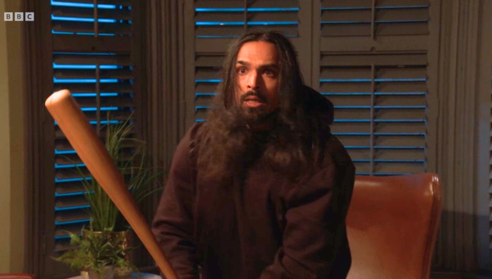 Ravi with a baseball bat on EastEnders