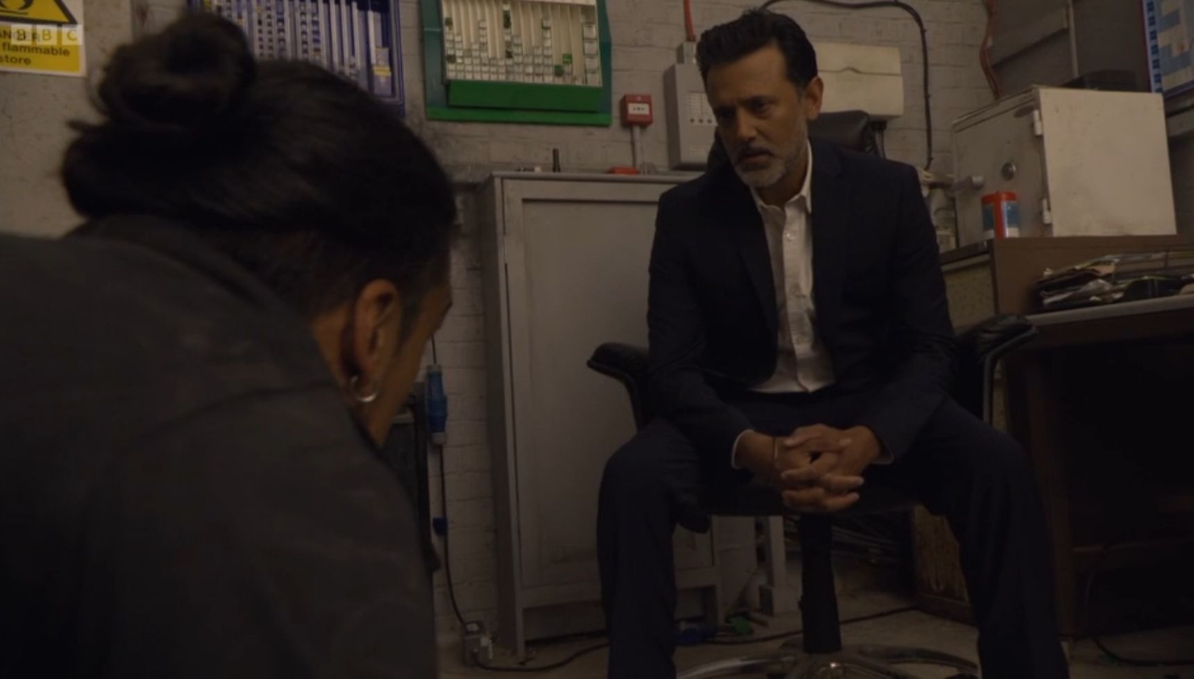 Nish looms over Ravi in The Arches on EastEnders