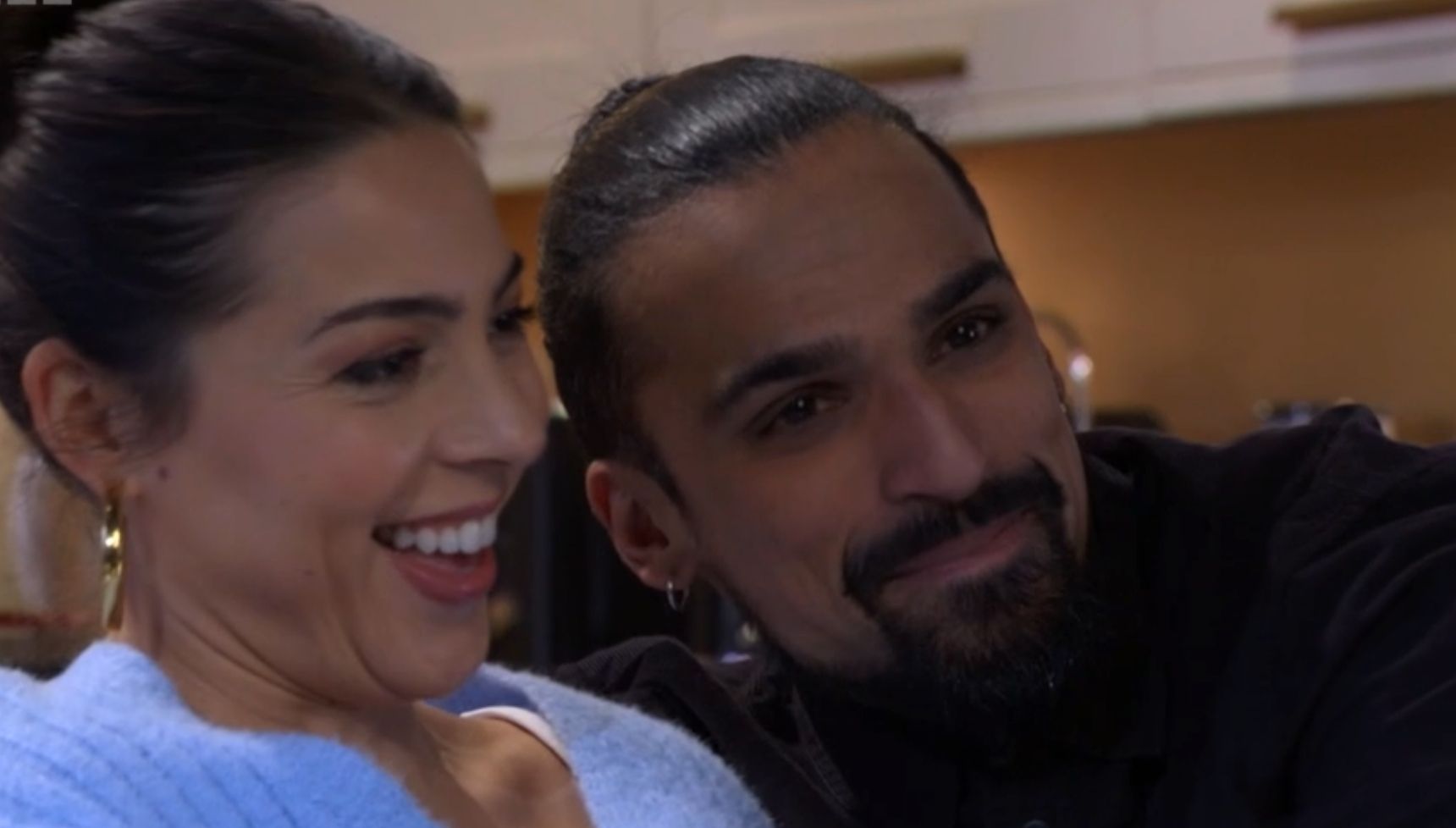 Priya and Ravi looking happy together