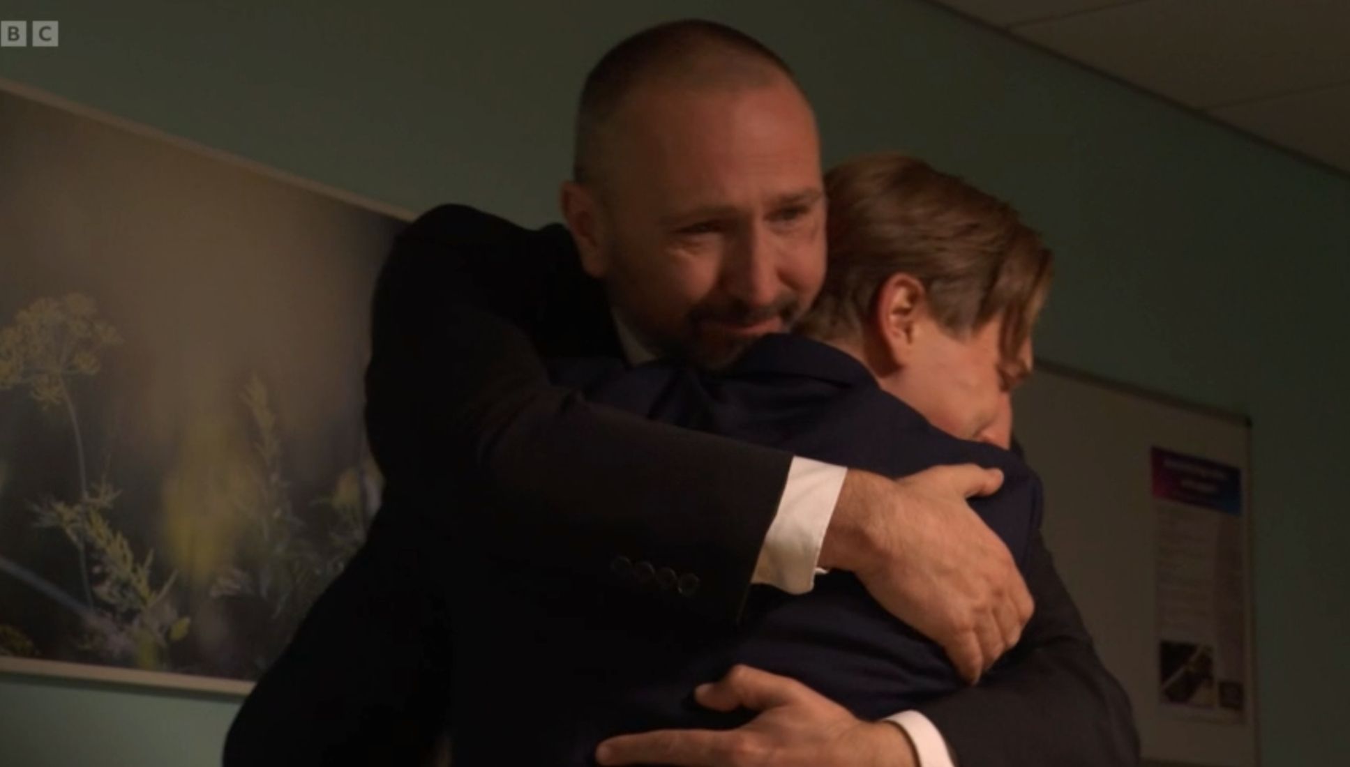 Ross hugs Joel as his fate is revealed in EastEnders 