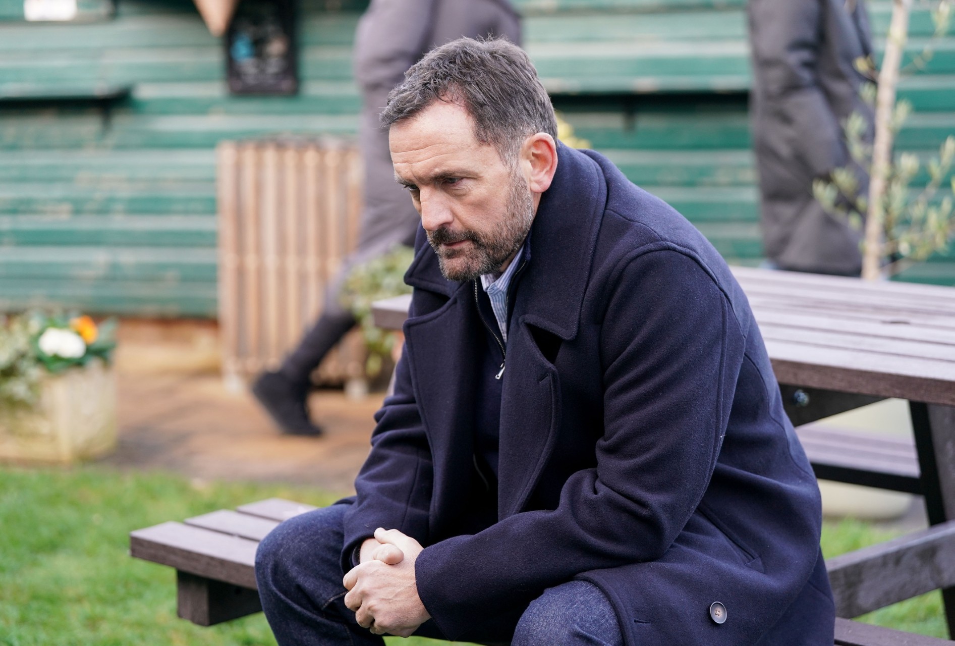 Jake nervously waits for Chrissie to meet him on a park bench