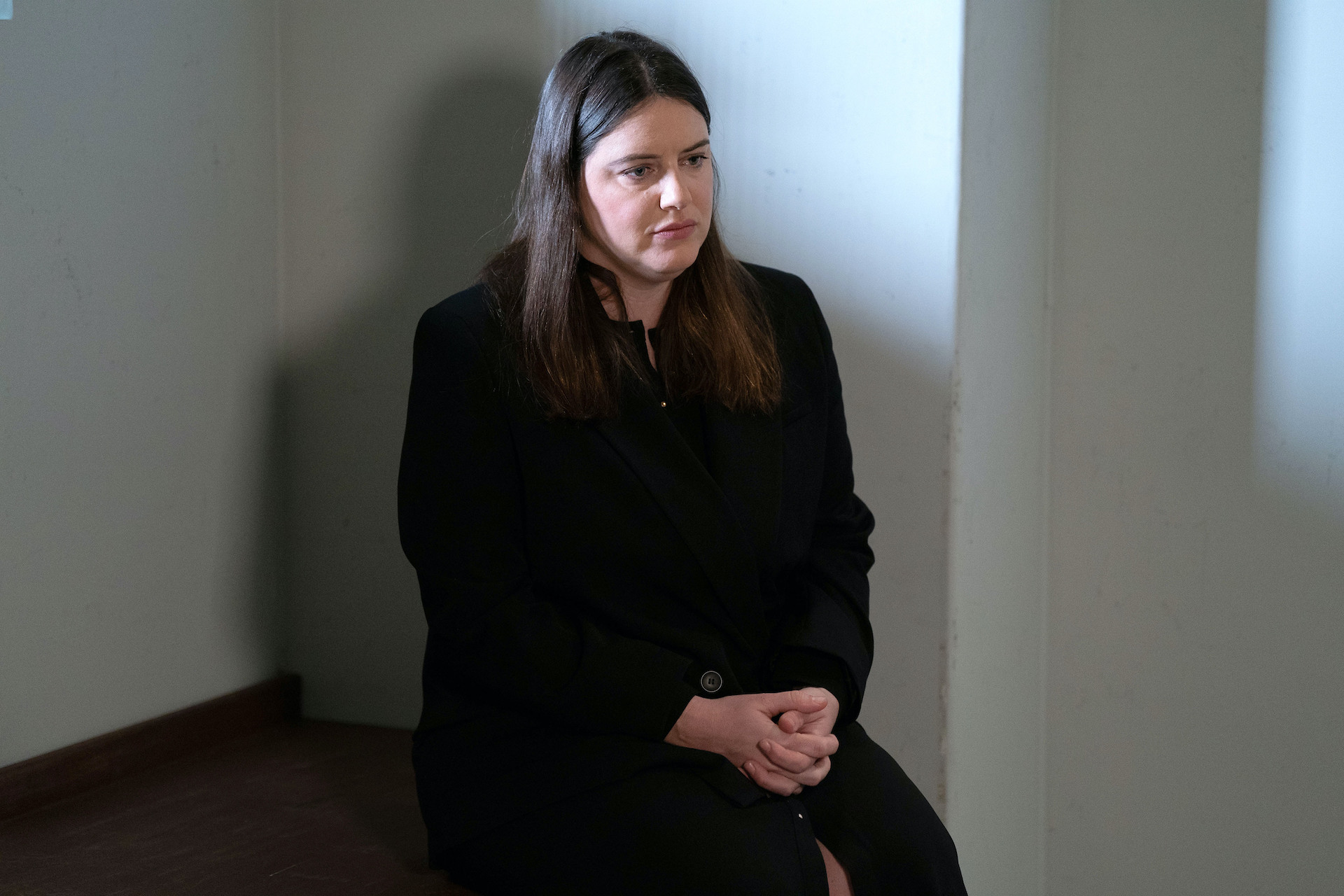 Zoe sits in her prison cell waiting for Kat