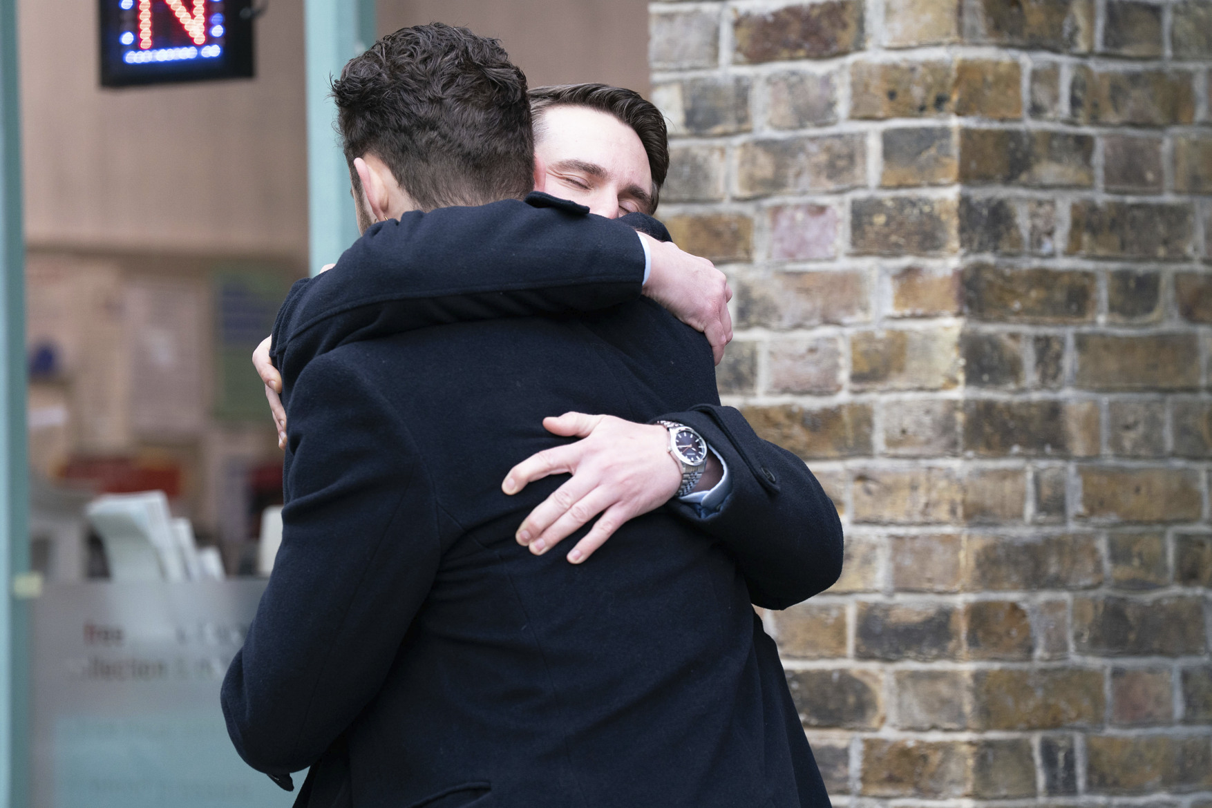 Johnny and Callum hugging