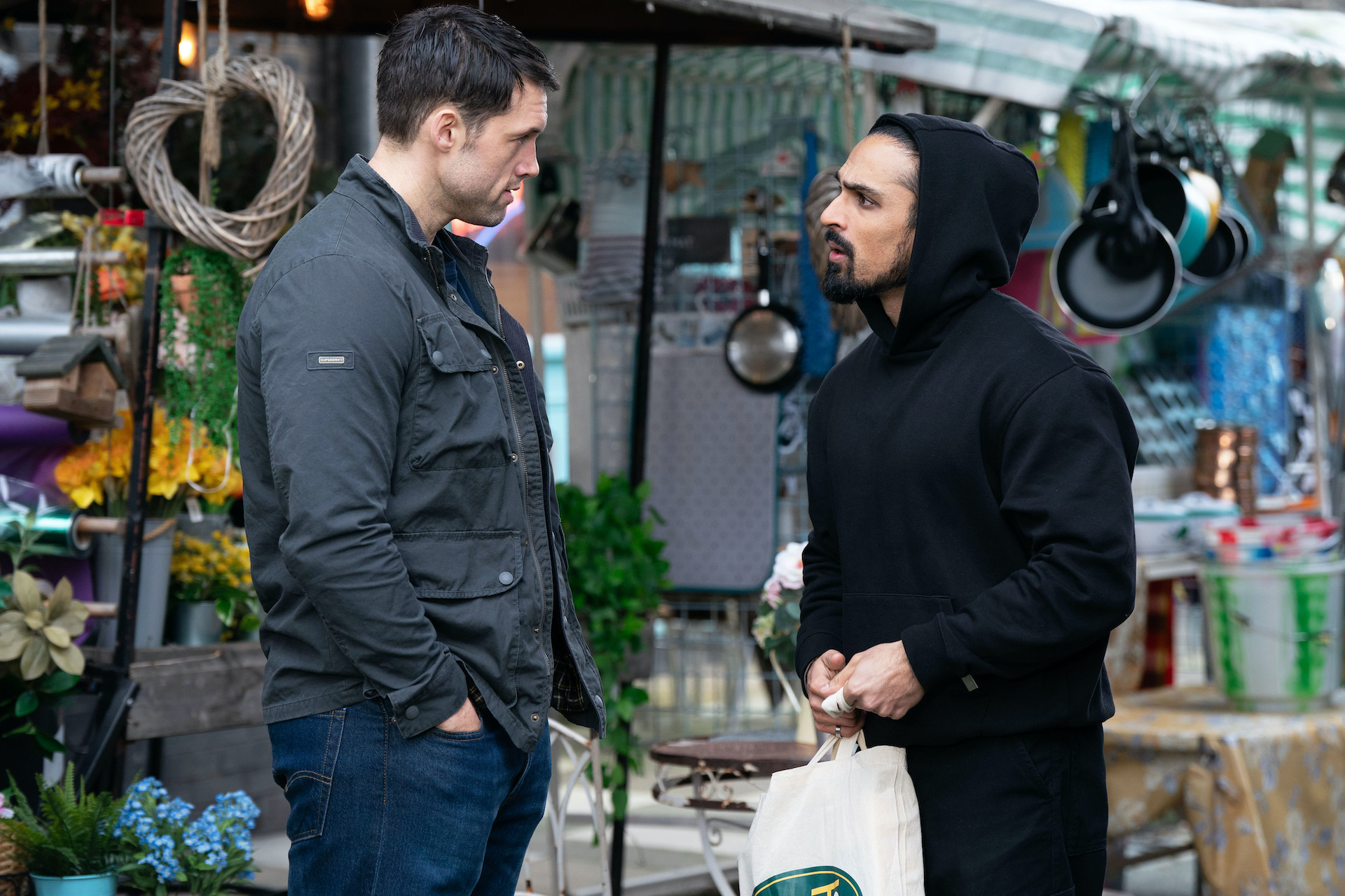 Ravi and Mark talking in the market in EastEnders spoilers