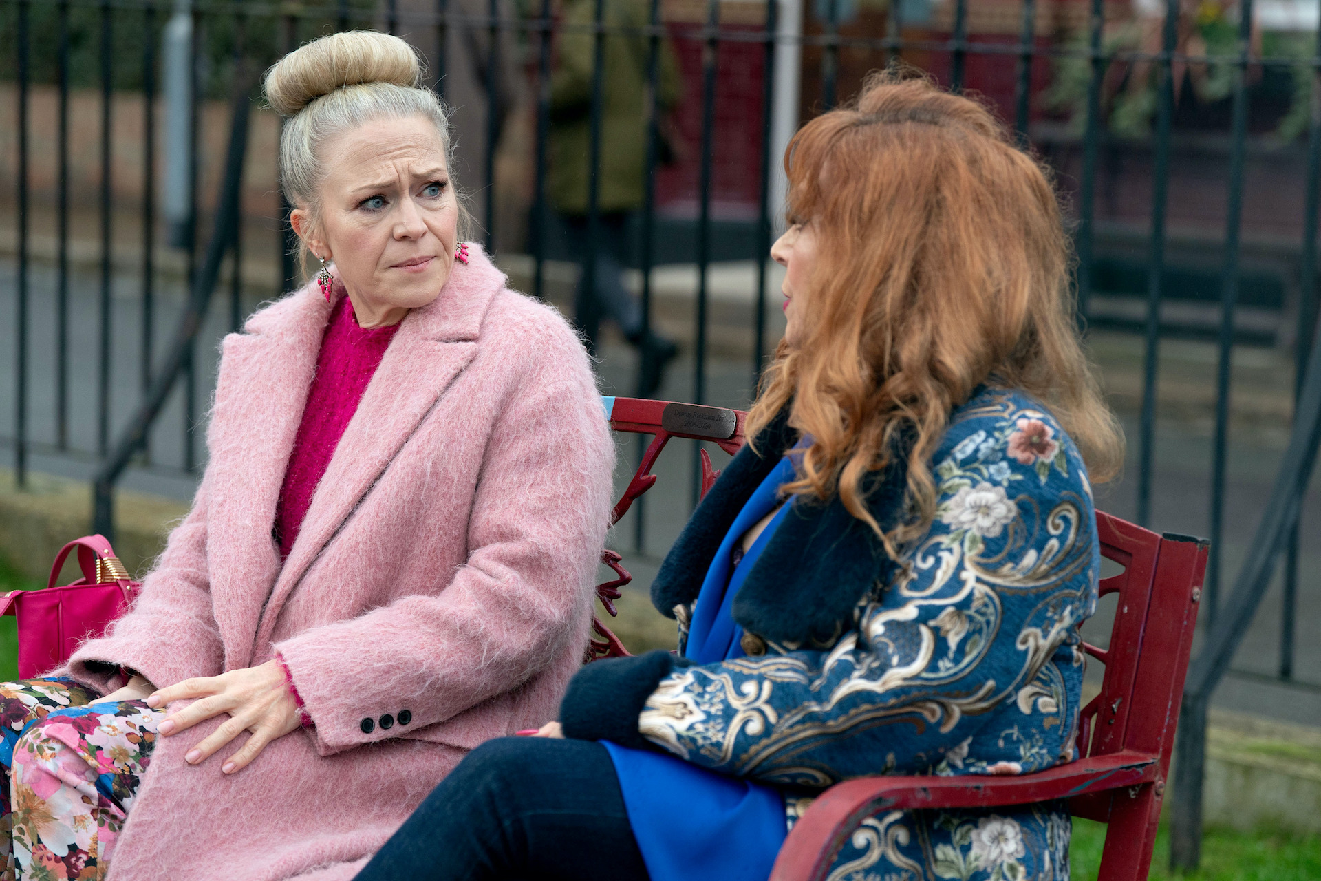 Elaine and Linda talk in the Square 