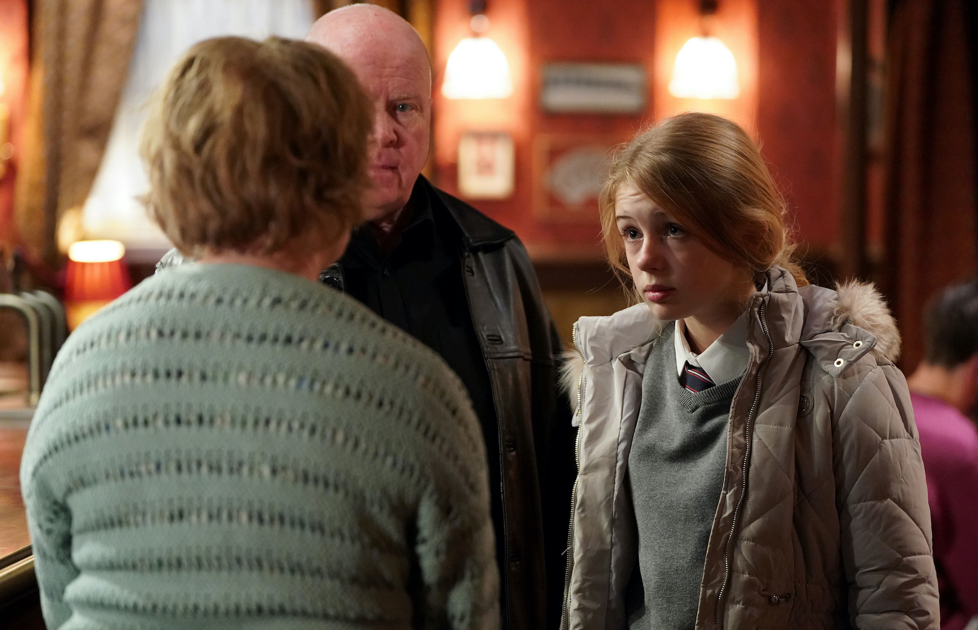 Lexi and Phil talking to Julie in EastEnders spoilers