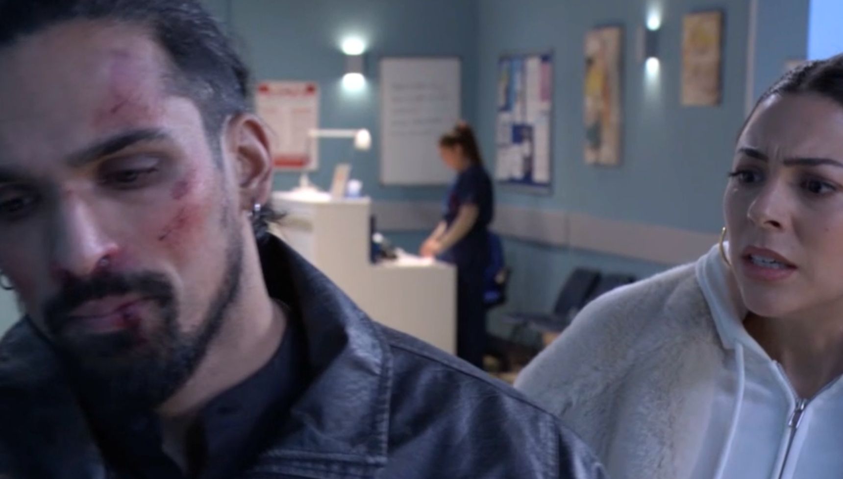 Ravi upset and Priya looks on in EastEnders 