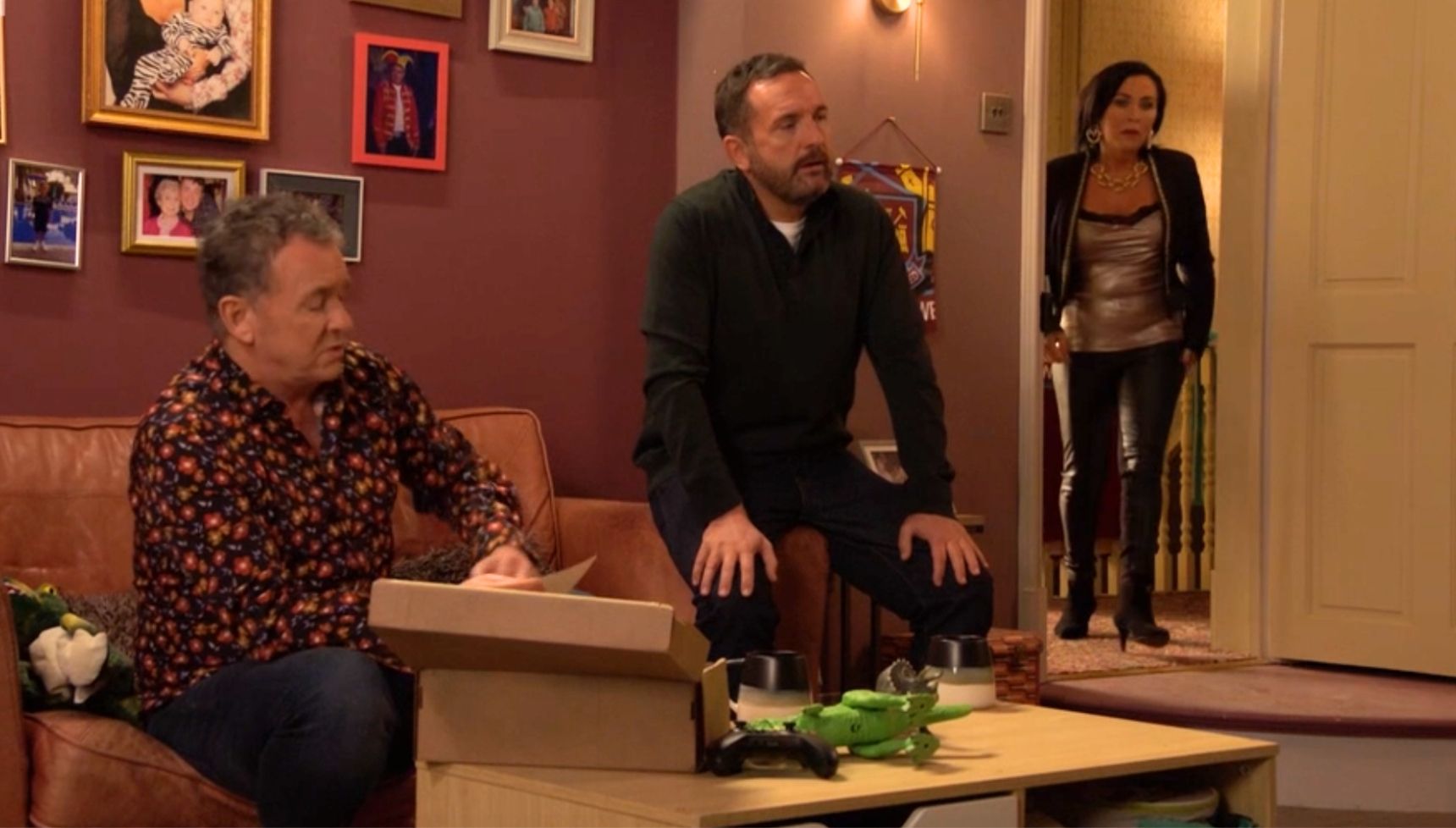 Jake and Alfie talking upstairs at The Vic as Kat walks in