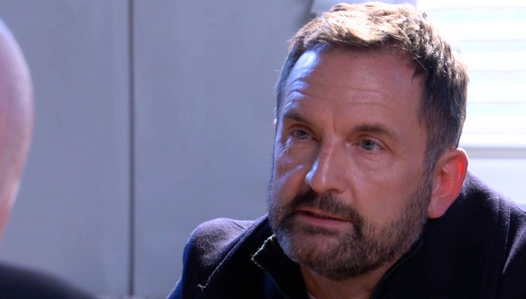 Jake talking seriously to Phil