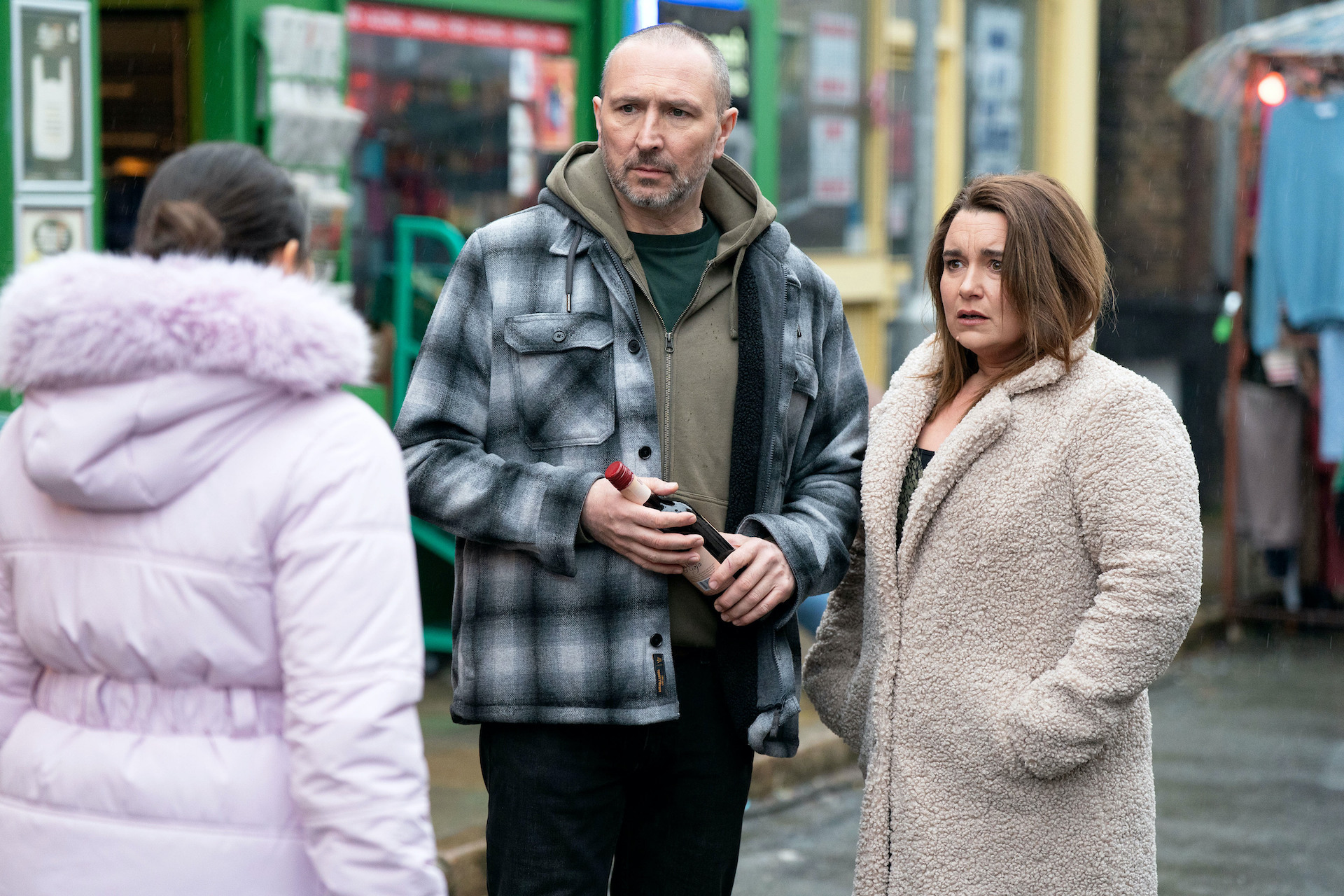 Priya talking to Vicki and Ross in the market 