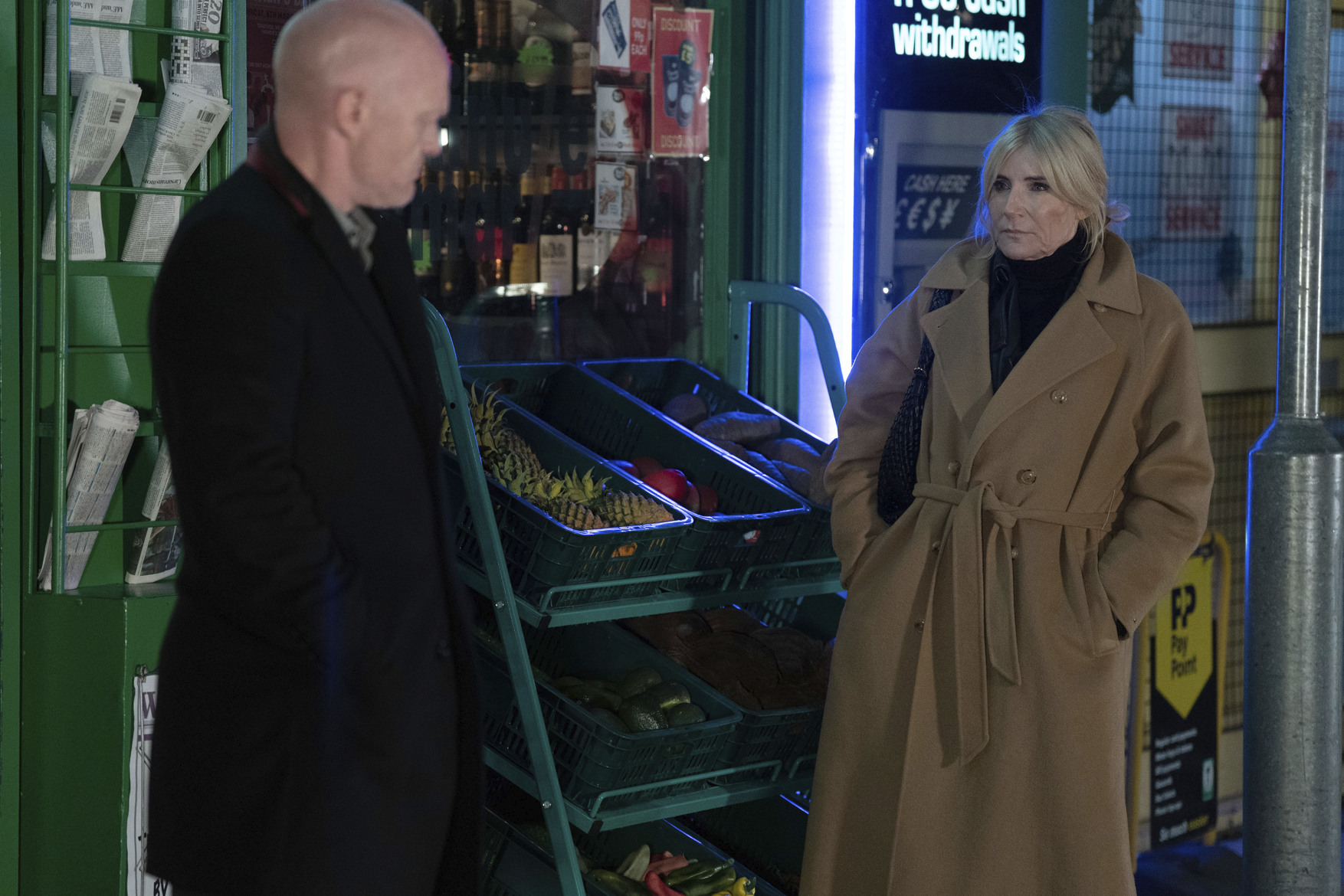 Cindy and Max talk in the street