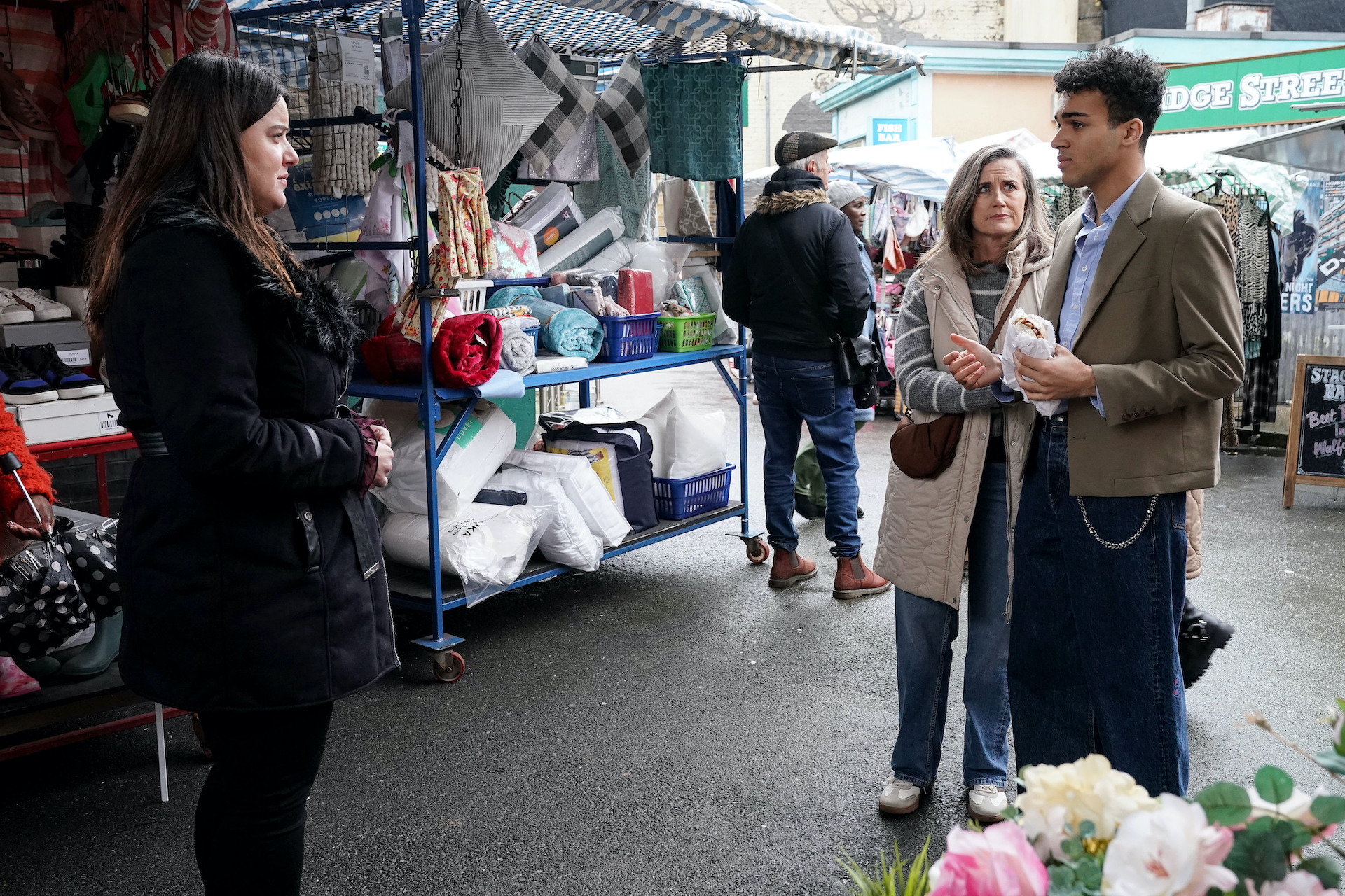 Zoe and Josh talk in the market