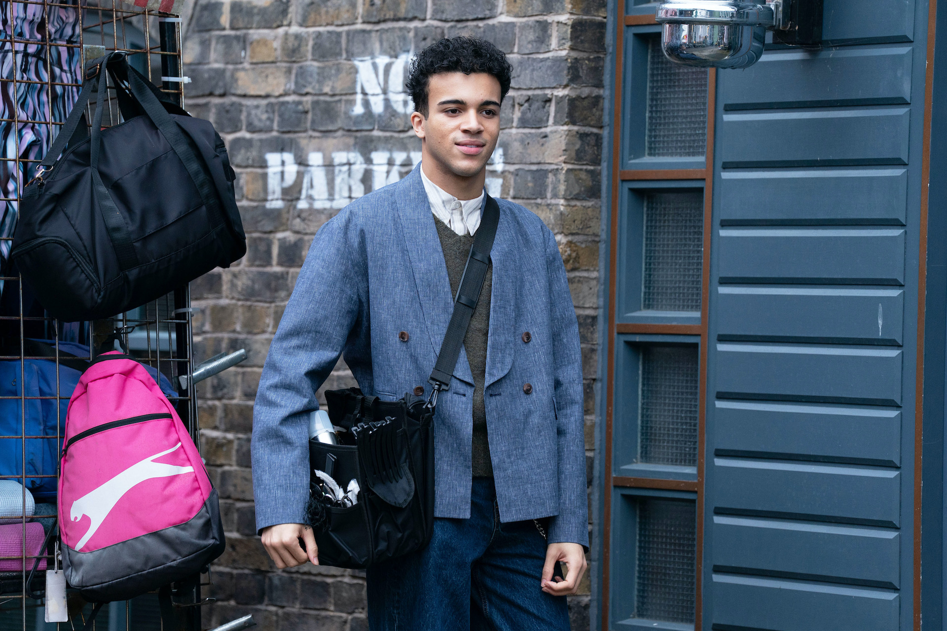 Josh walking in the market, deep in thought in EastEnders spoilers