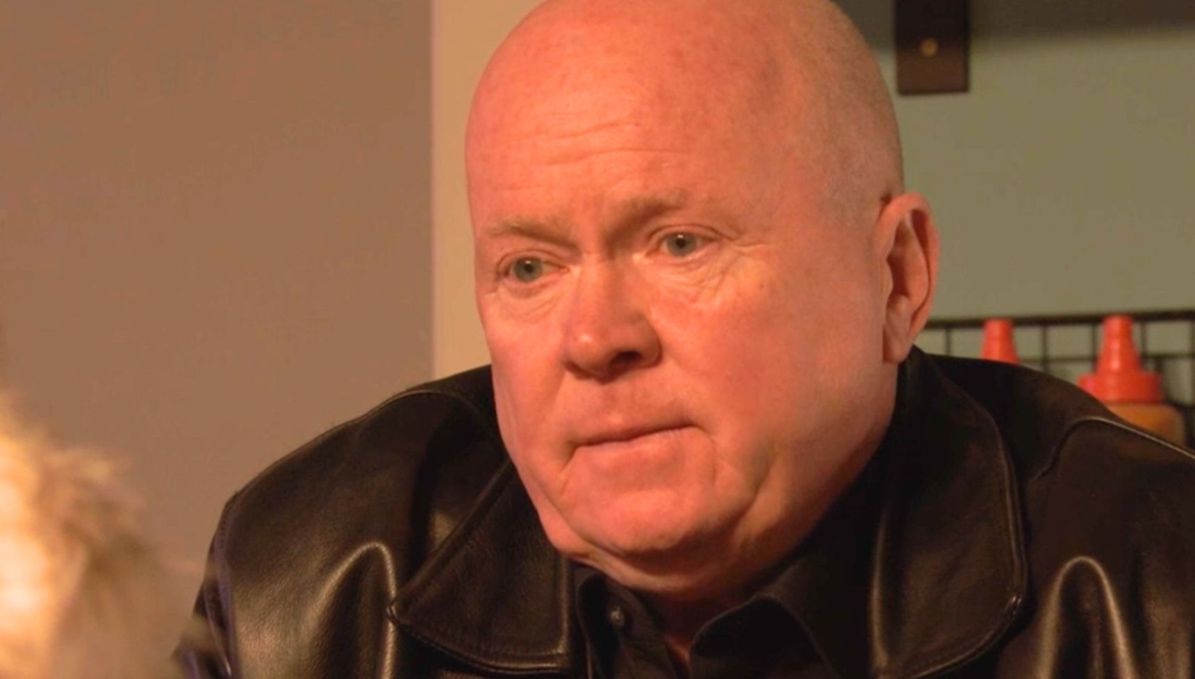 Phil talking to Lexi in the cafe