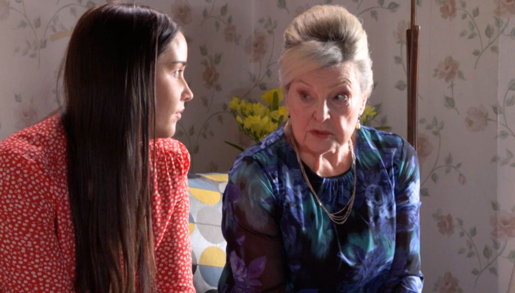 Cora looking at Lauren with a worried expression
