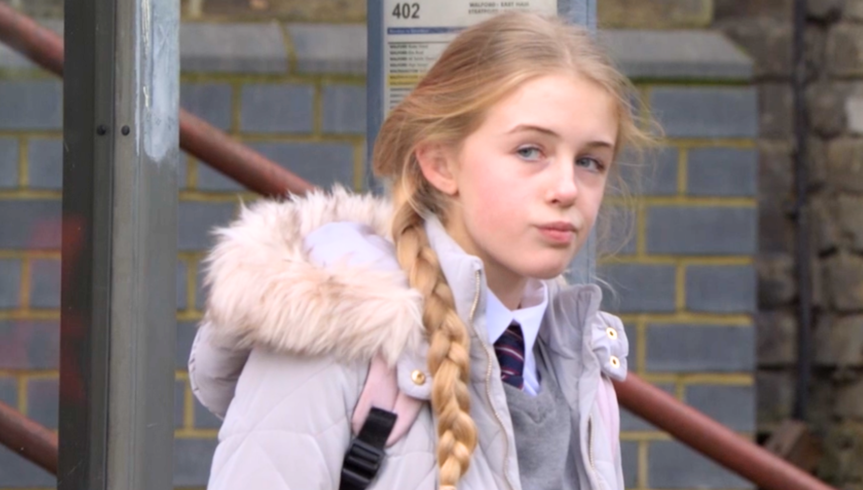 Lexi looking sheepish as she skips school