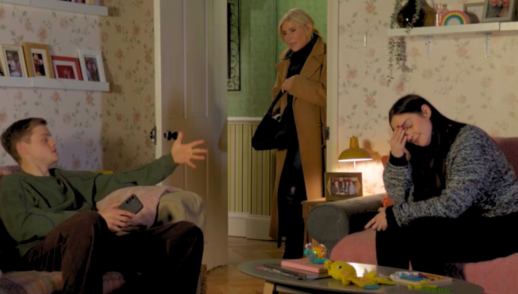 Lauren, Cindy and Oscar talking in the lounge