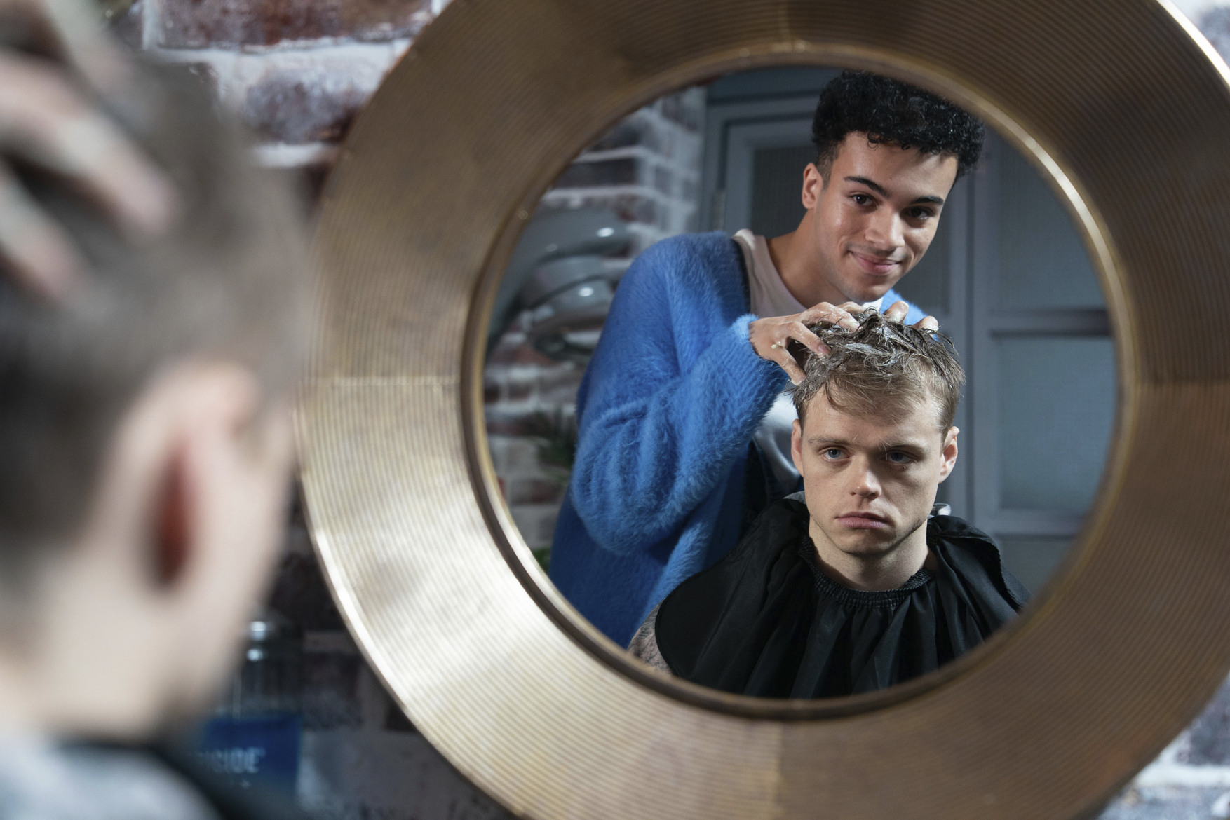 Josh does Oscar's hair