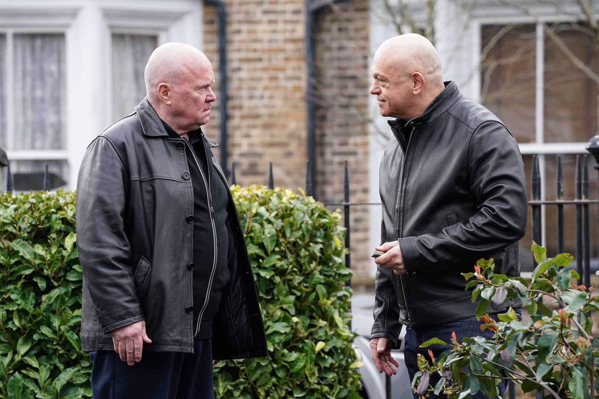 Grant and Phil arguing in the Square 