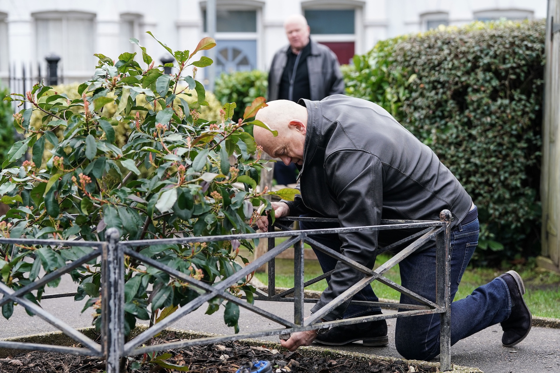 Grant looking for something on the floor in EastEnders spoilers 