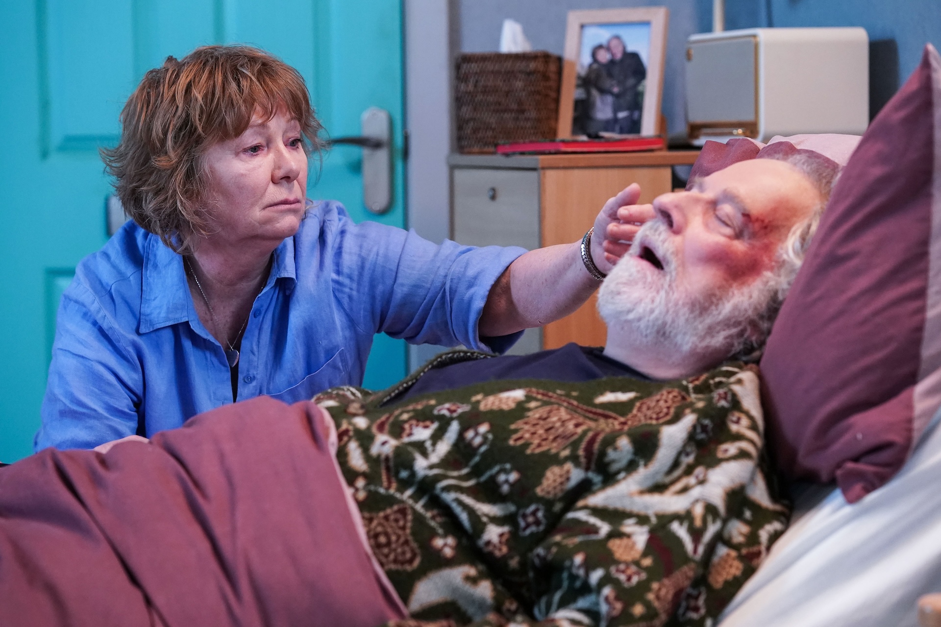 Nigel with Julie by his bedside