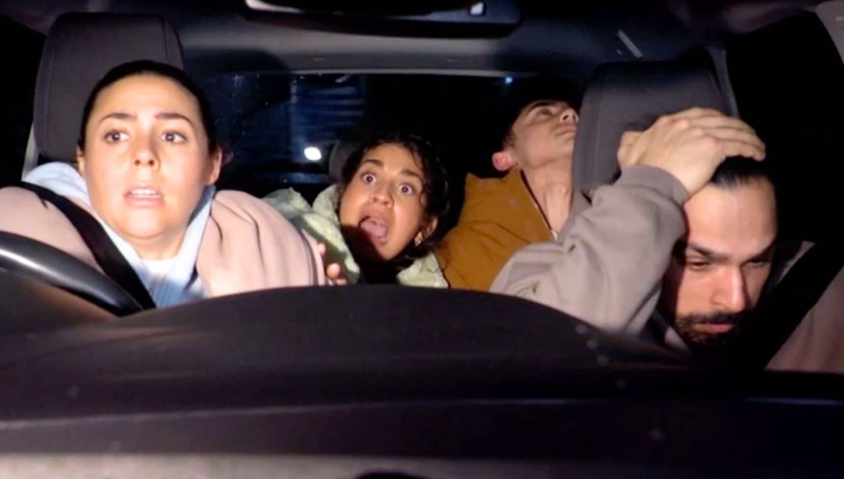 Priya and Avani looking scared as Nugget has a seizure