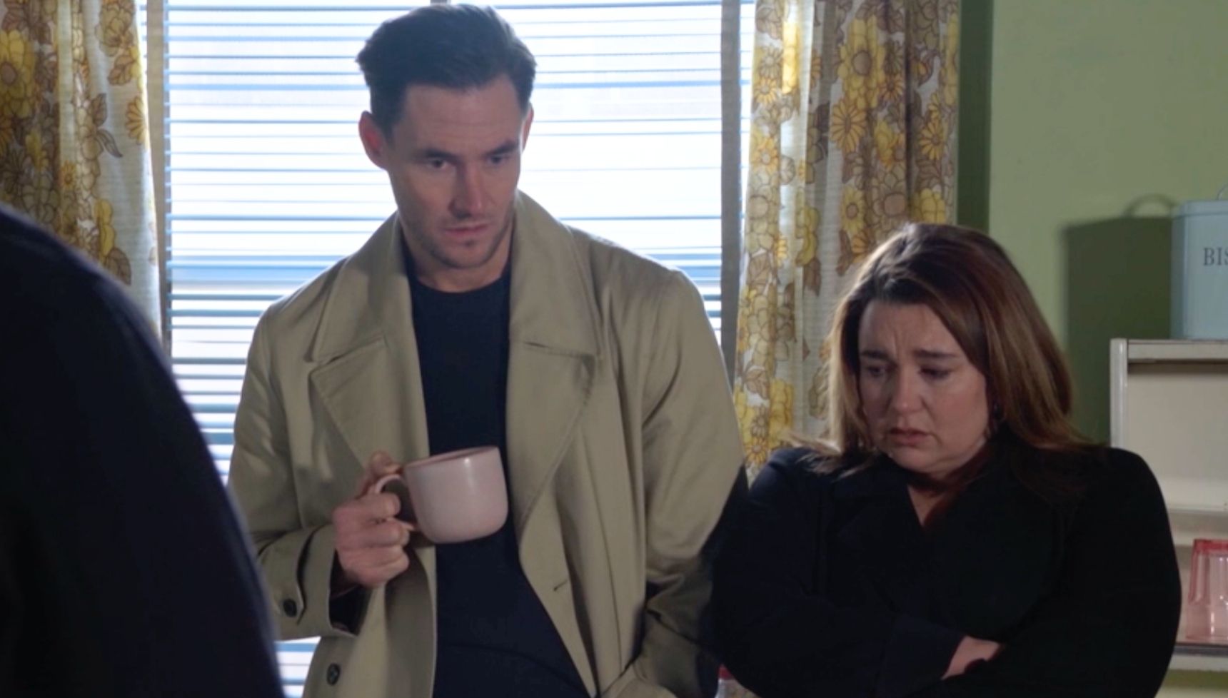 Vicki and Zack looking guilty as they talk to Mark, Kathy and Ian in EastEnders 