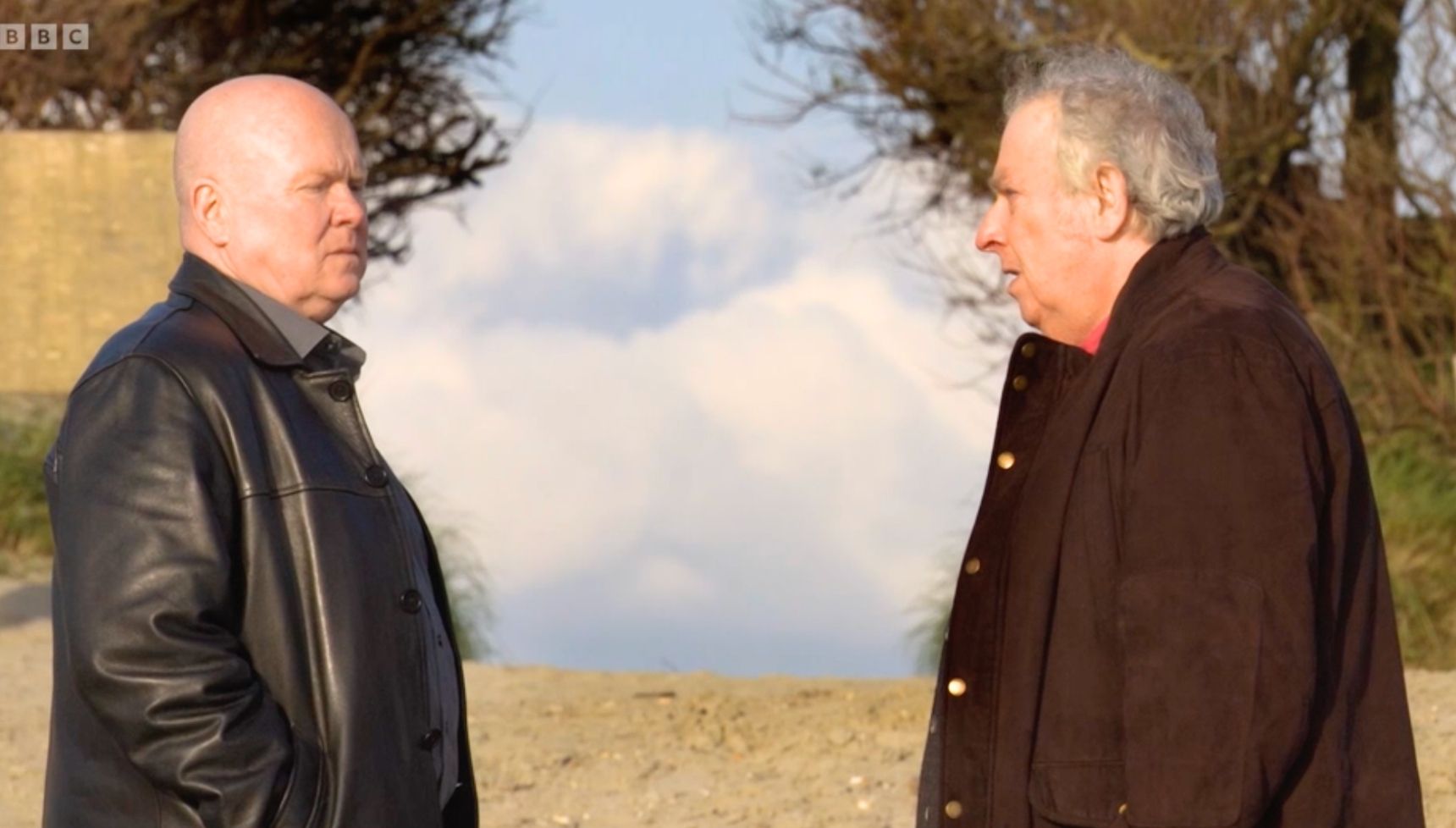 Nigel and Phil talking on the beach in EastEnders