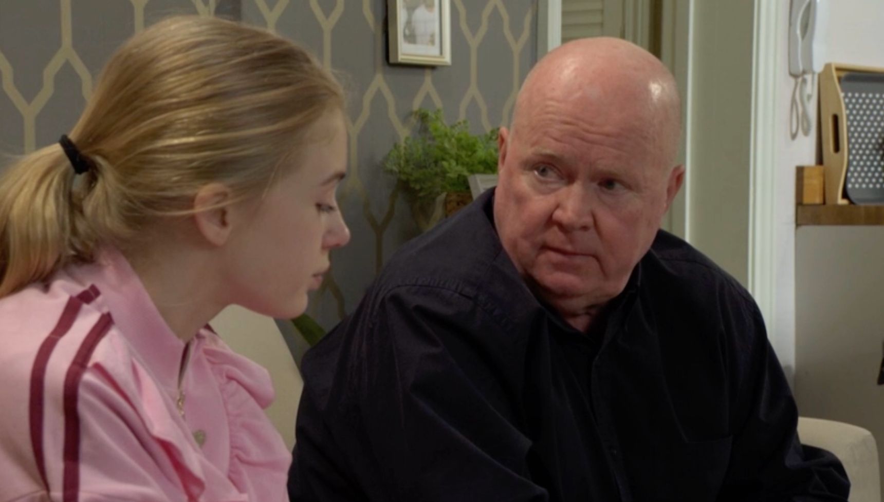 Lexi and Phil deep in conversation