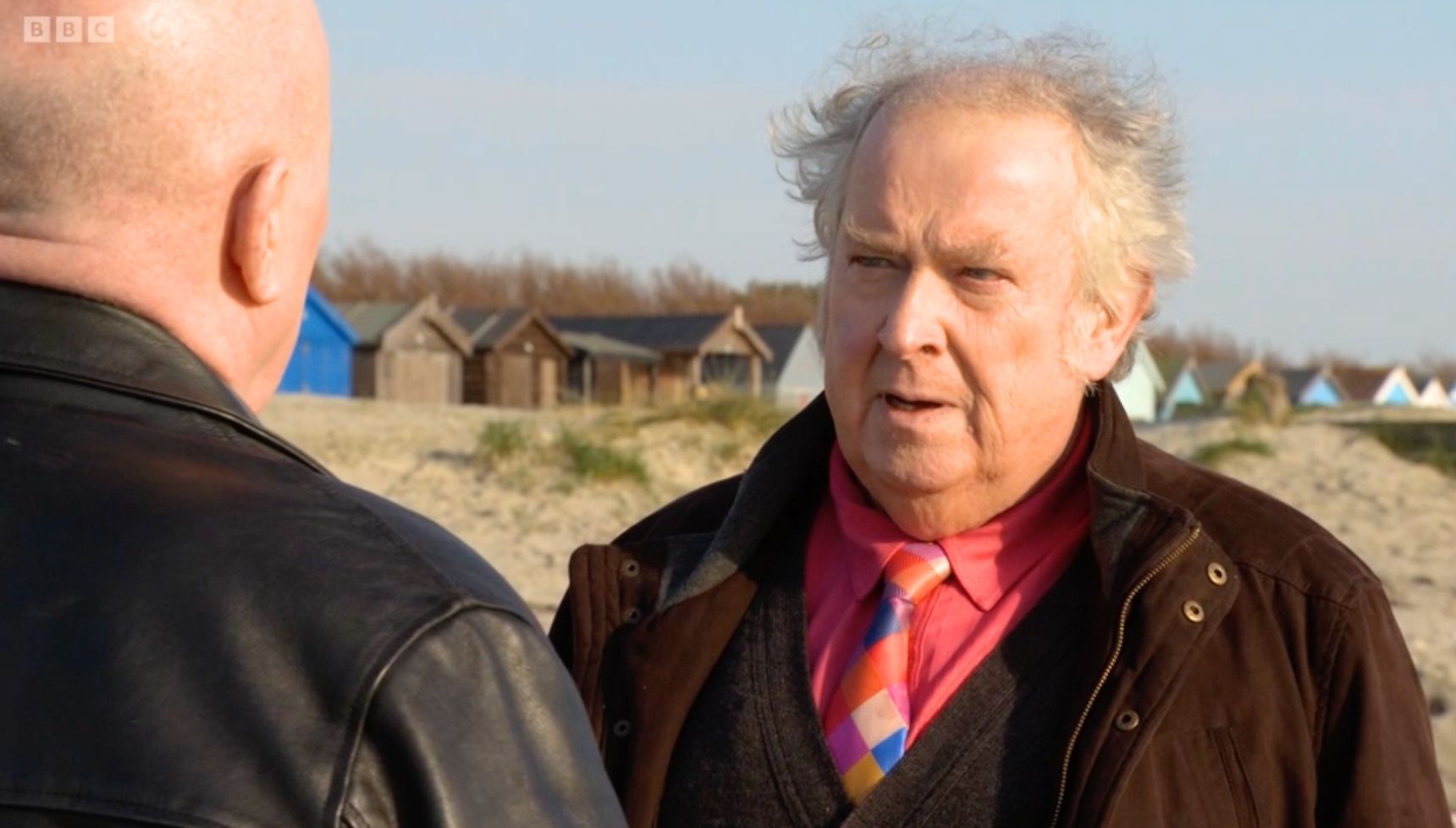 Nigel and Phil talking on the beach in EastEnders