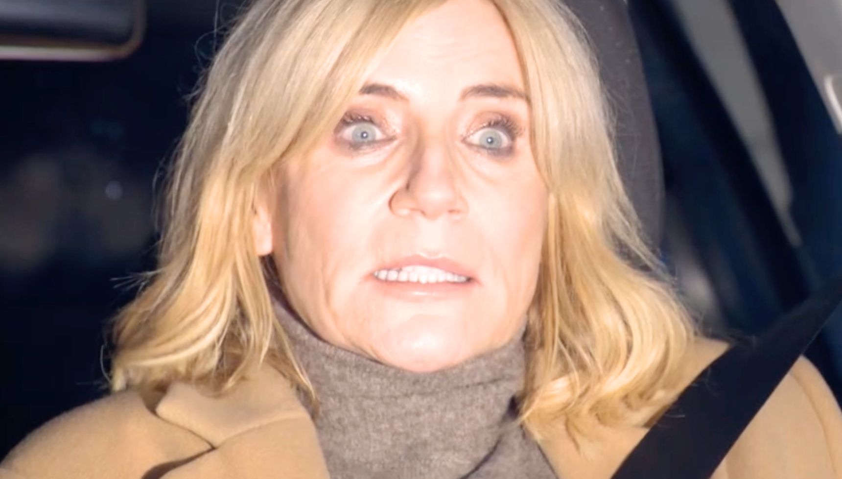 Cindy looking scared as headlights blind her in the EastEnders crash