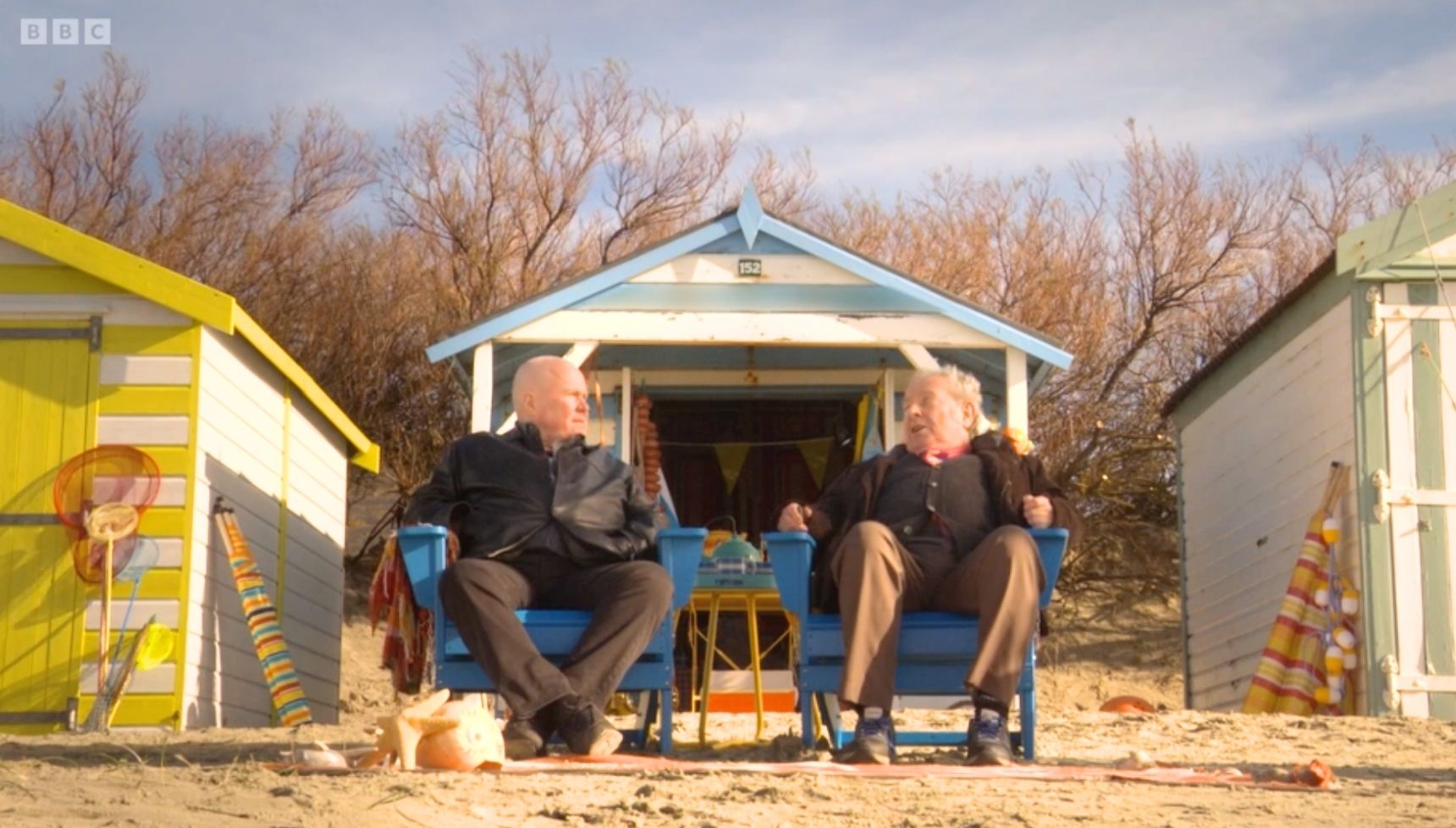 Nigel and Phil talking on the beach in EastEnders 