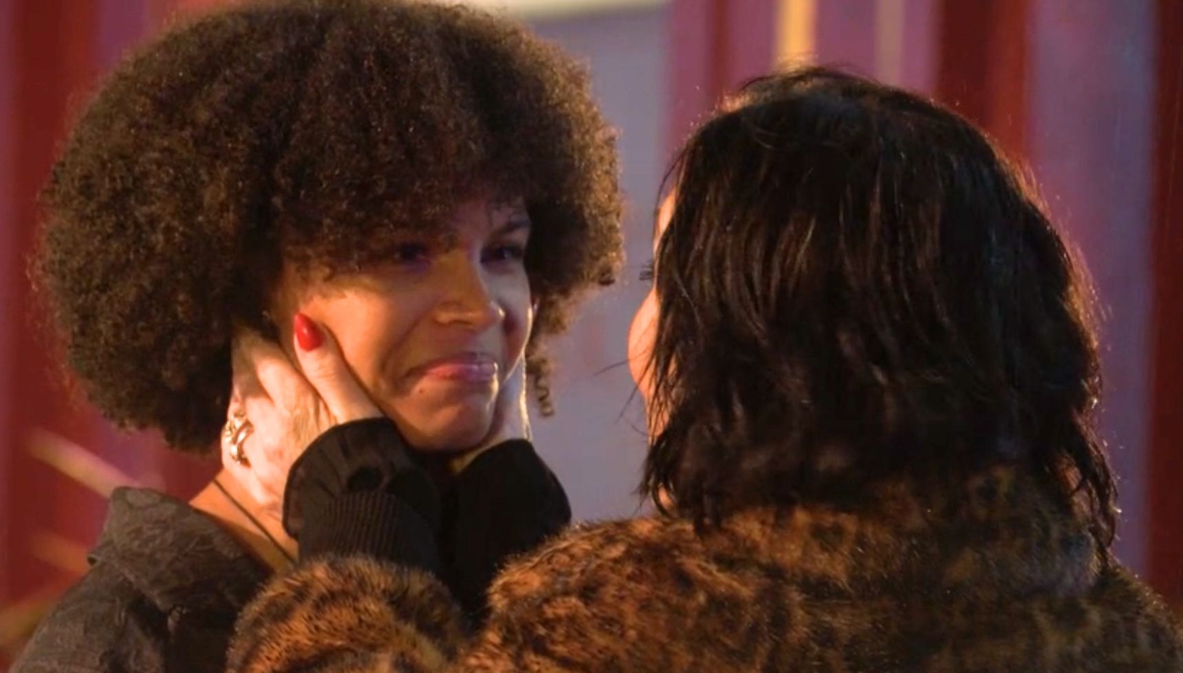 Jasmine and Kat talk outside the pub