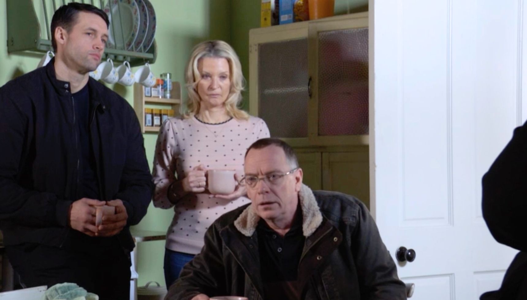 Mark, Kathy and Ian all talking in the kitchen