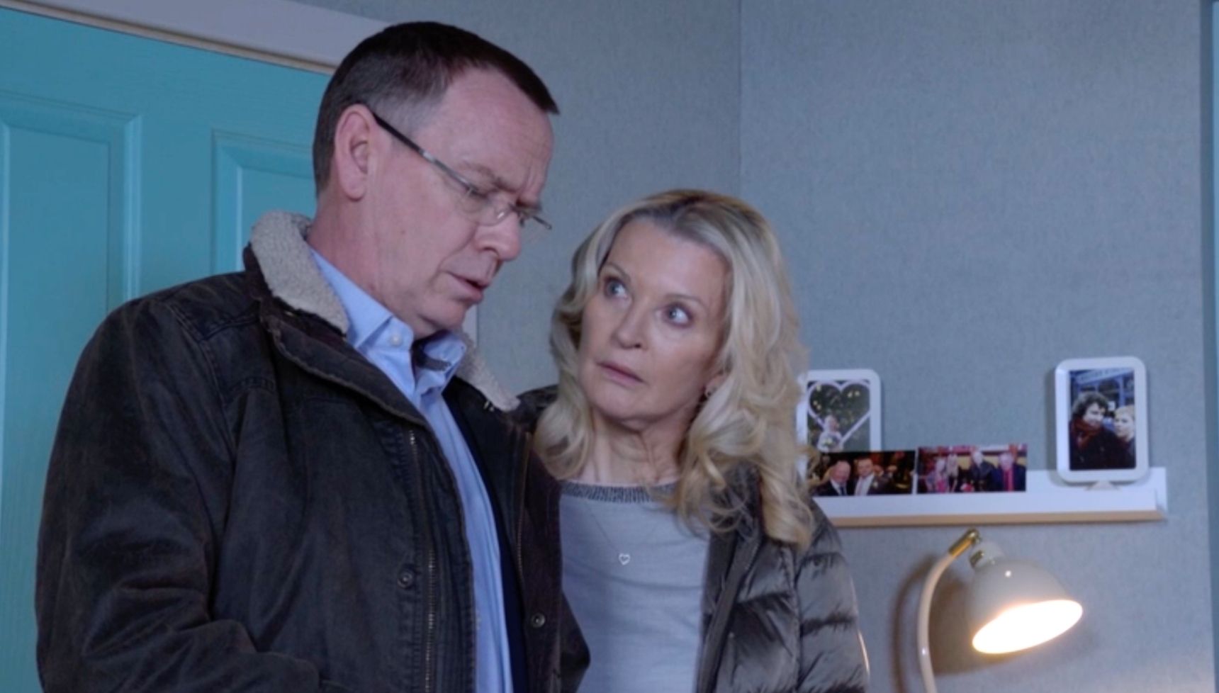 Ian and Kathy looking shocked as they read Louie's messages 