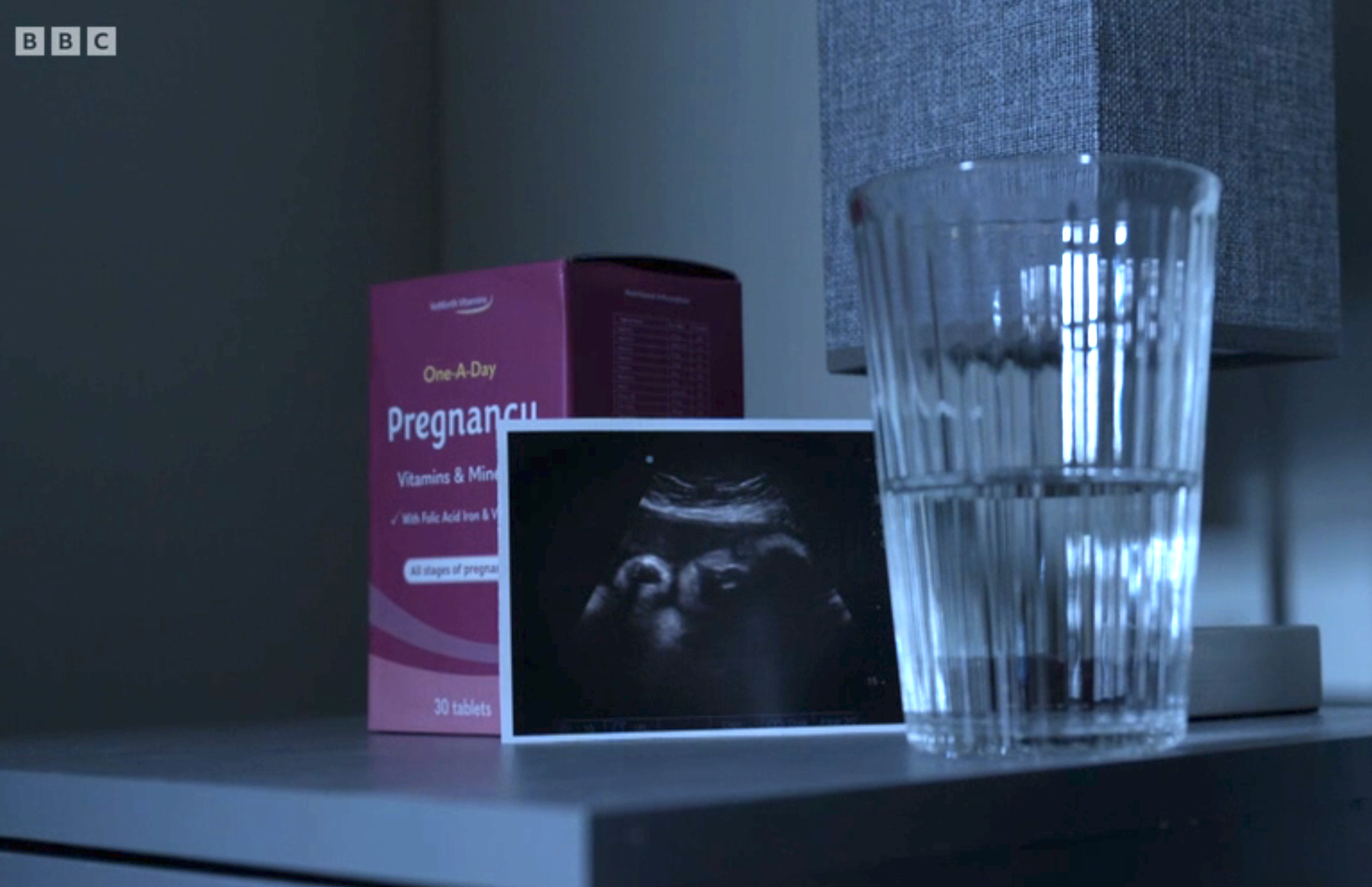 Pregnancy vitamins and scan photo in the new year flashforward