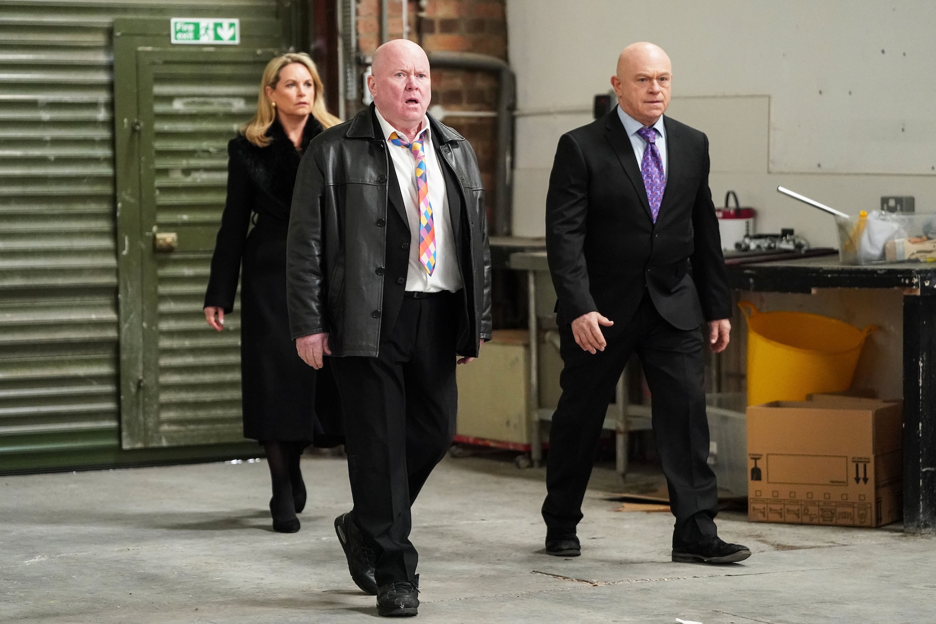 Sam, Grant and Phil walking into Russell's warehouse 