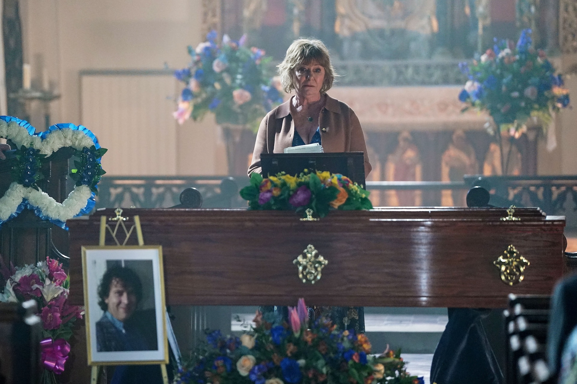 Julie giving her eulogy in church for Nigel's funeral in EastEnders spoilers