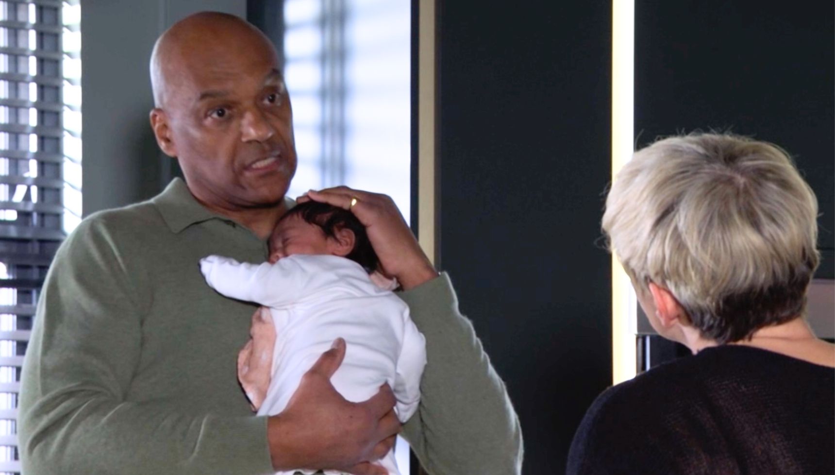 George holding baby Ivy
