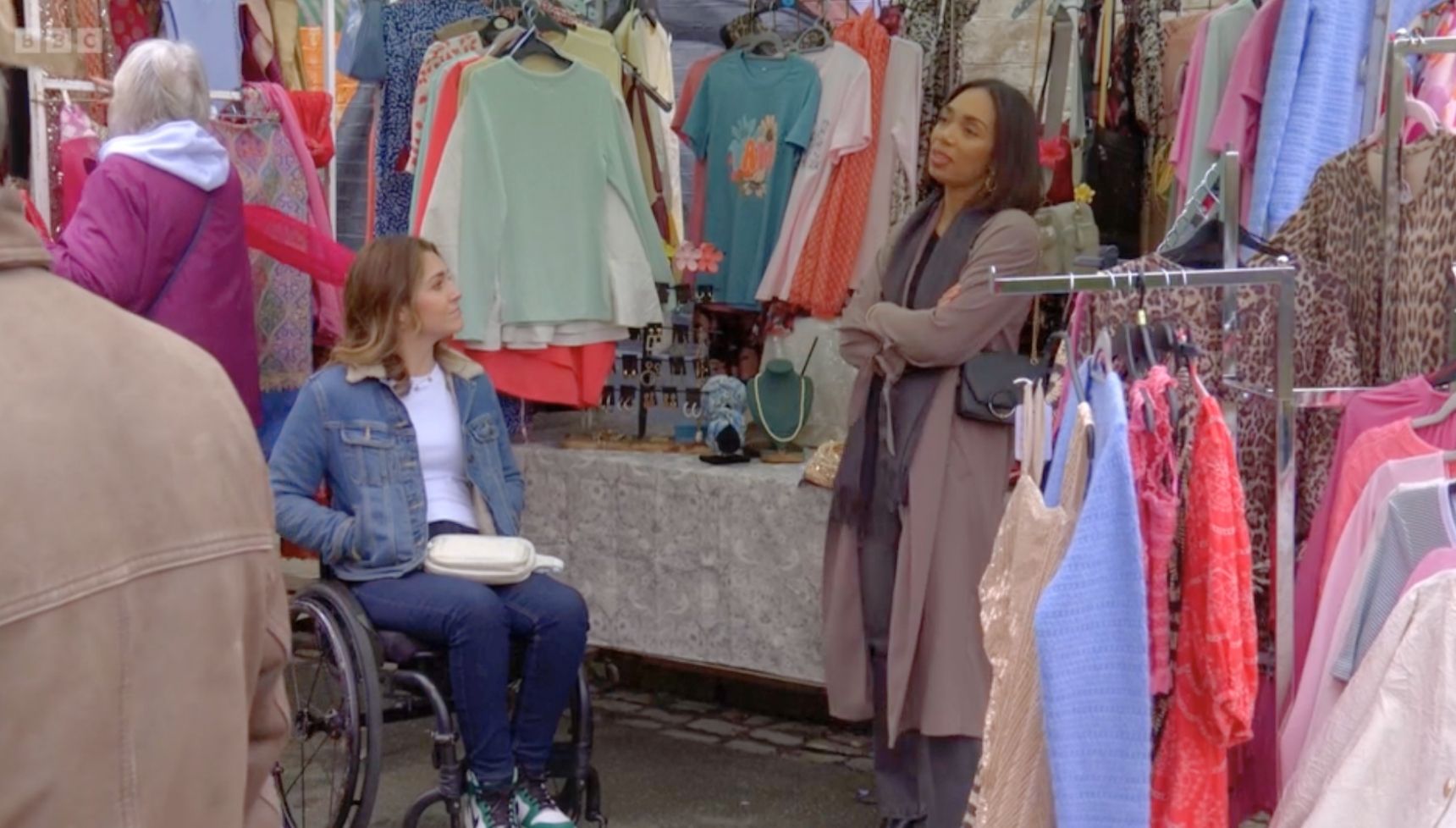 Chelsea and Penny talking at the market 
