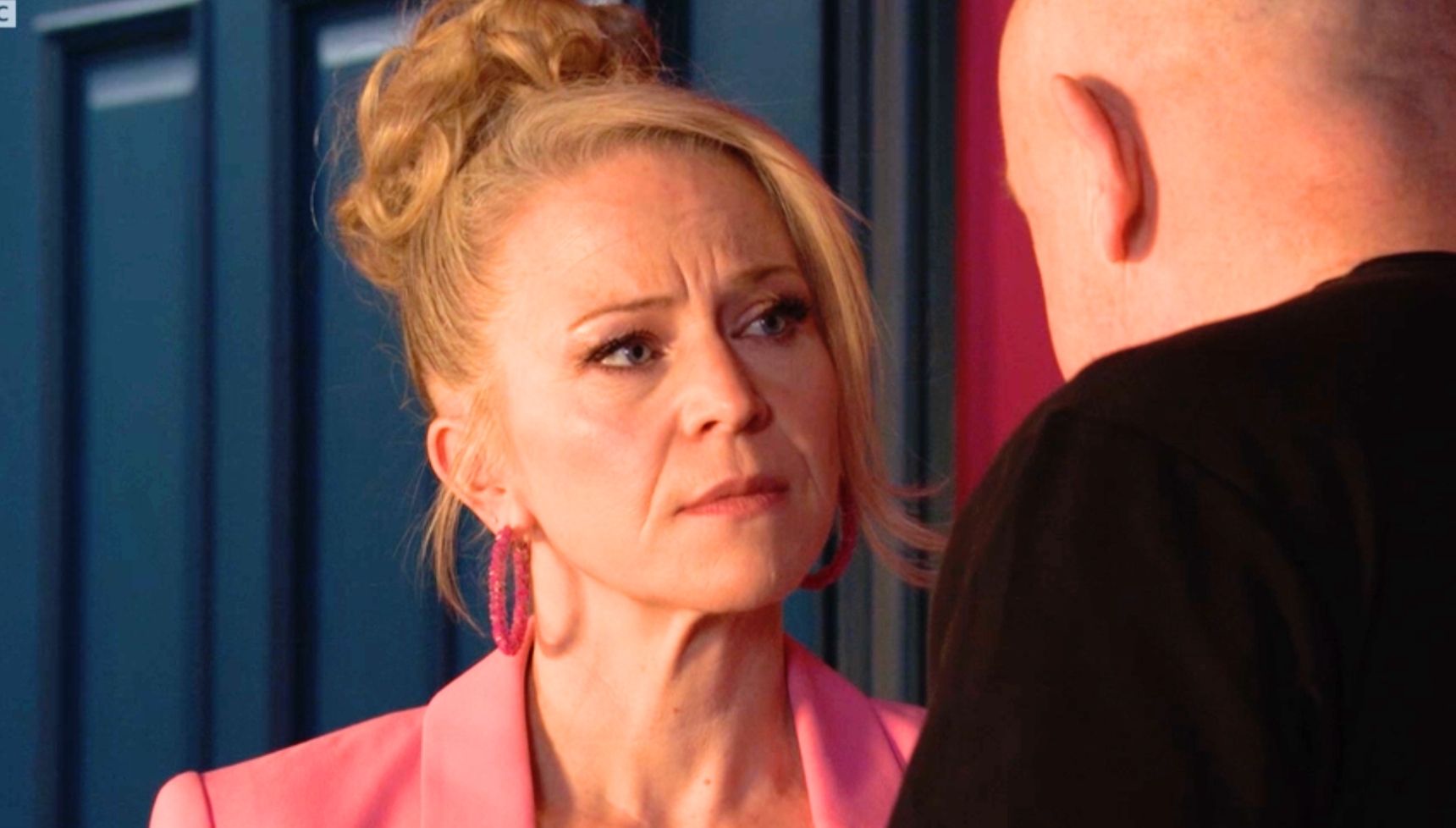 Grant looking intently into Linda's eyes in EastEnders 