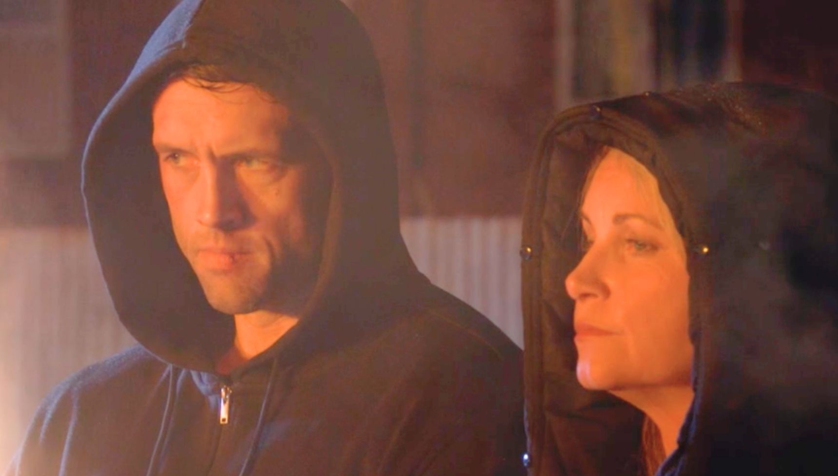 Sam and Mark watch a car on fire in EastEnders