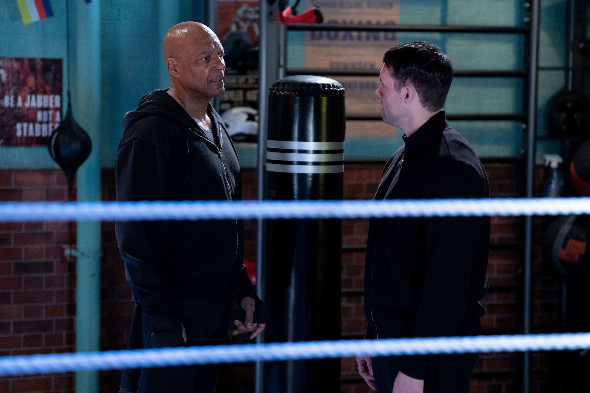 George and Mark talk in the boxing gym
