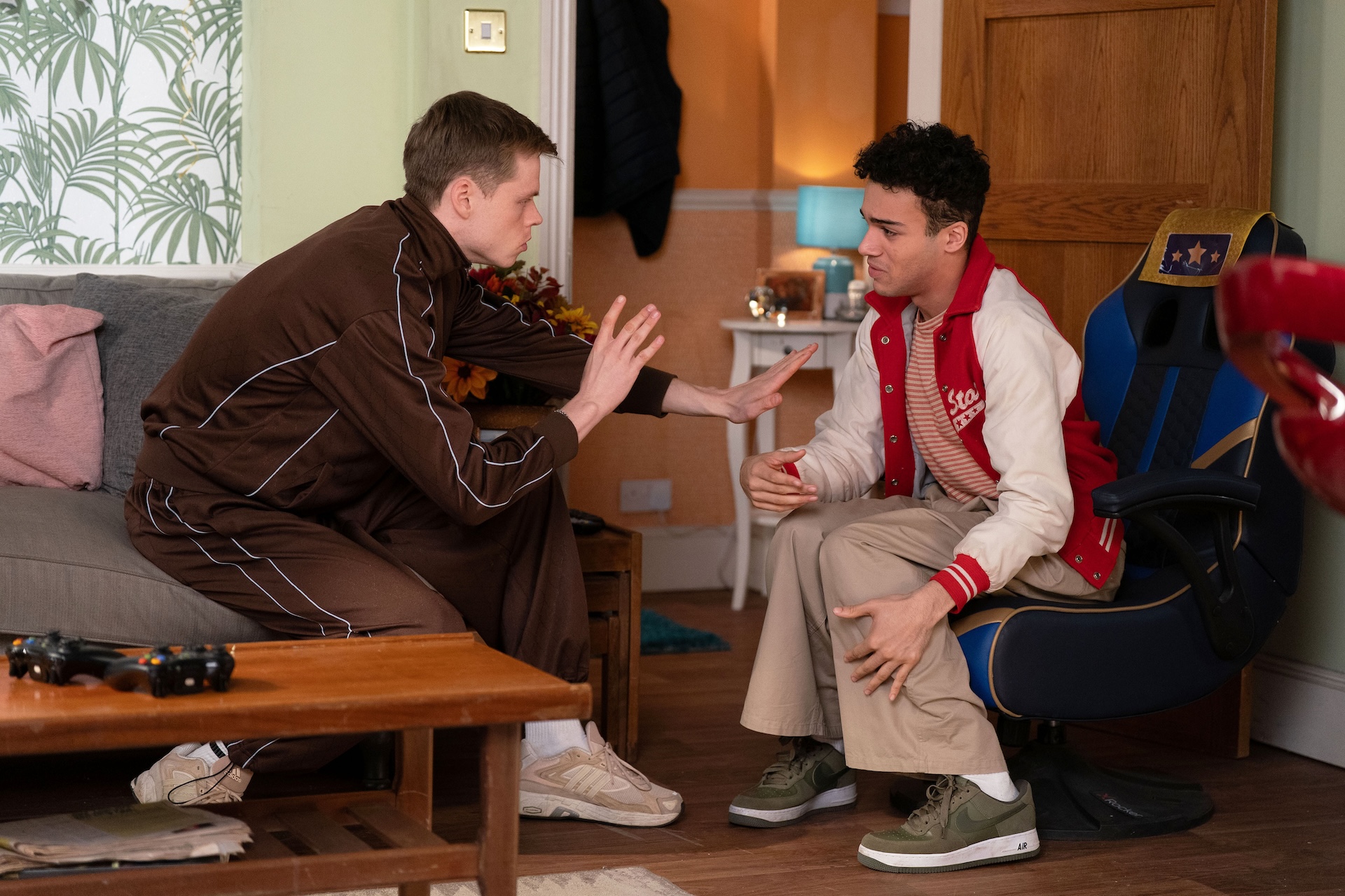 Oscar and Josh looking worried in EastEnders spoilers 
