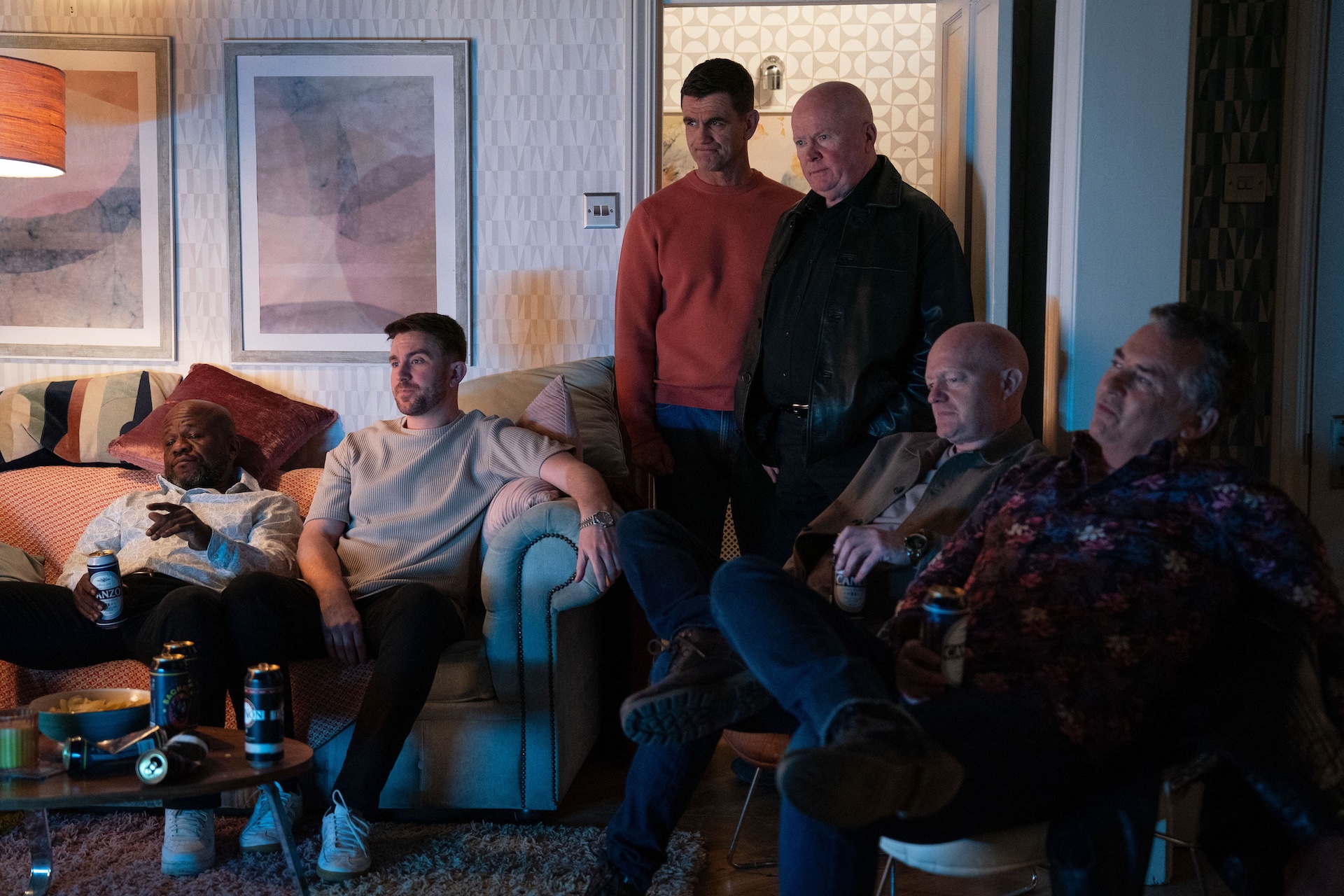 The men of Walford at Jack's watching TV with him 