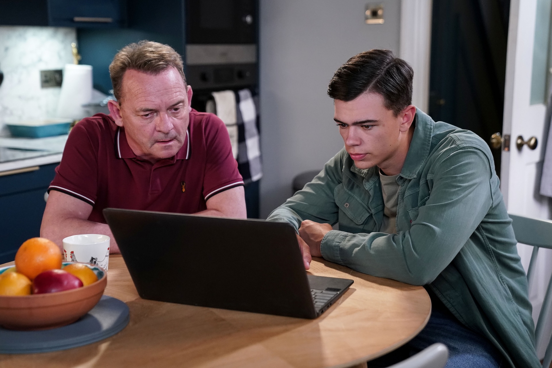 Billy and Will looking at a computer in EastEnders spoilers