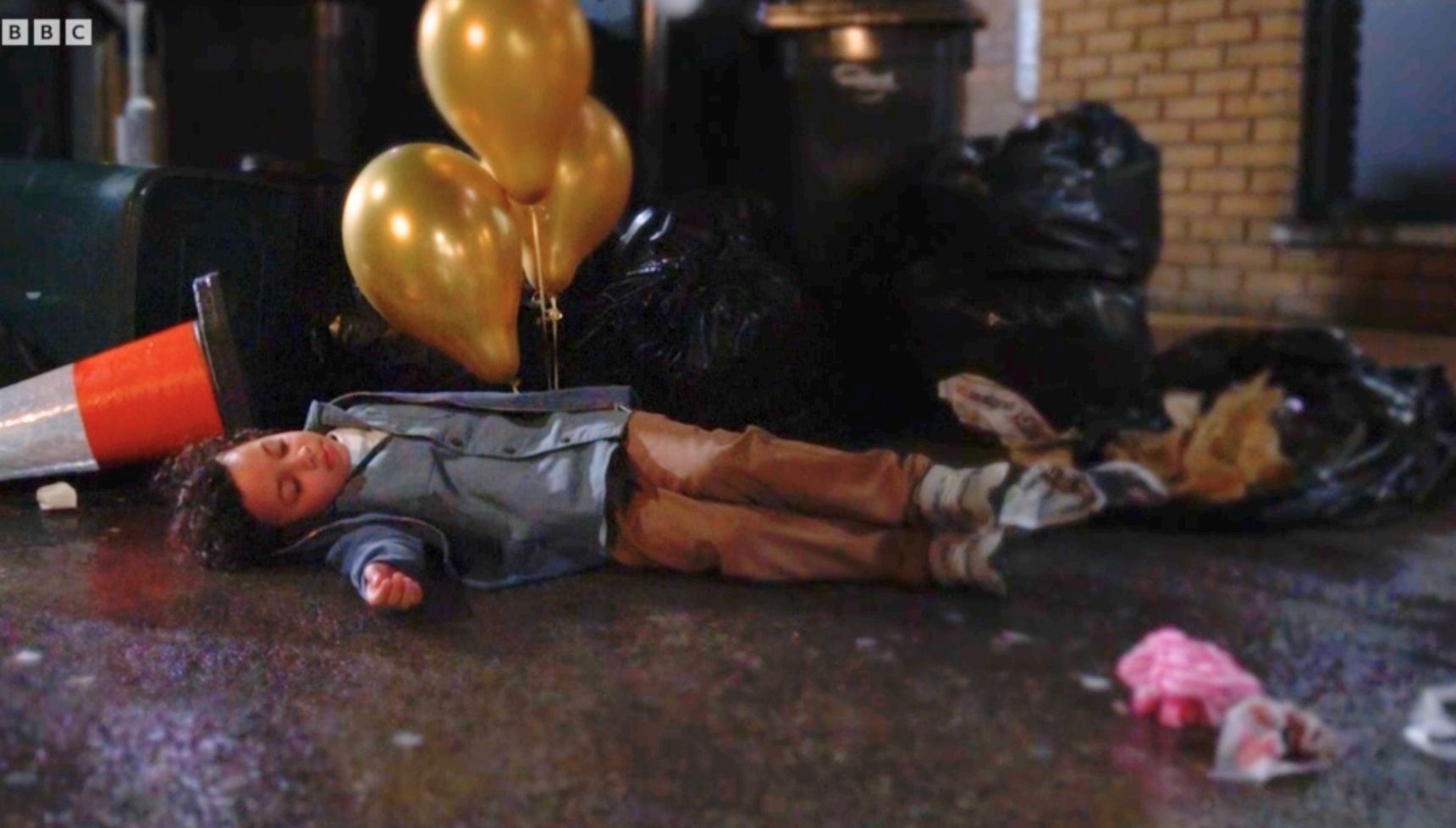 Jordan lying on the ground after being run over 