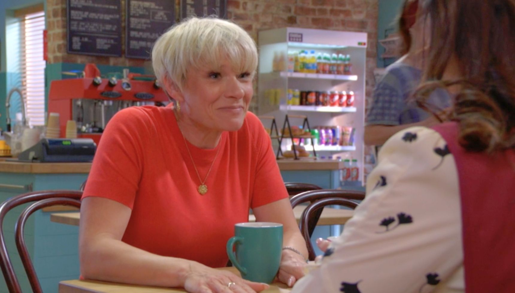 Honey and Nicola chatting in the cafe
