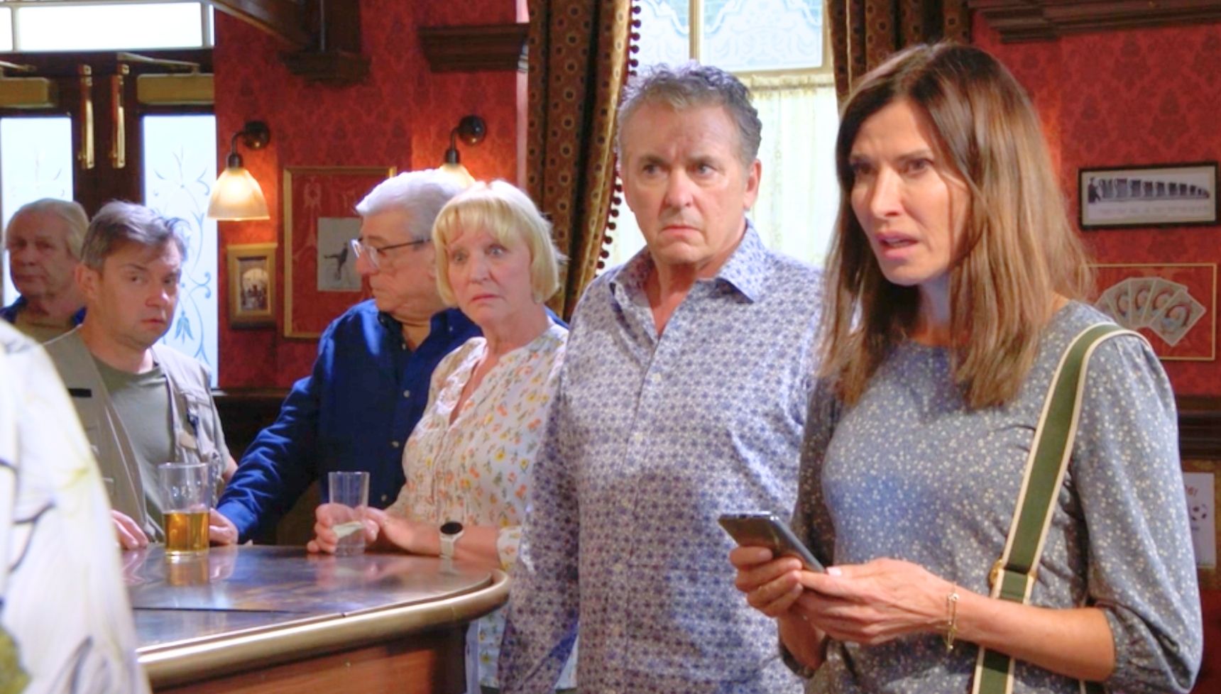 Everyone looking shocked as Bea plays the voice note 