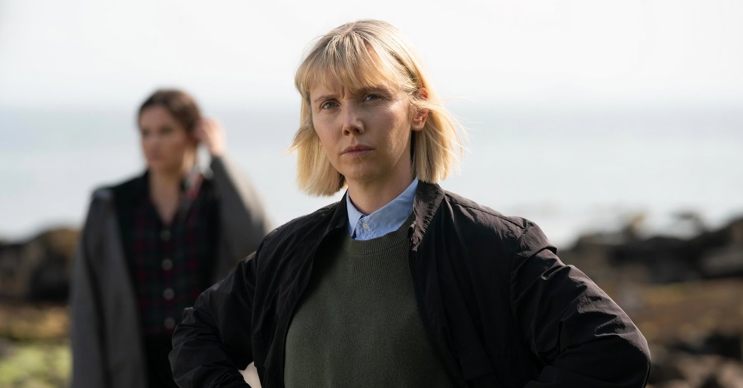 Laren Lyle stars as Karen Pirie in series one of the ITV crime drama Karen Pirie, standing on the chilly coast of Scotland’s St Andrews
